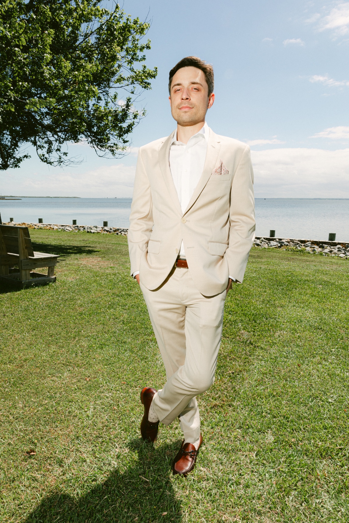 groom in tan suit