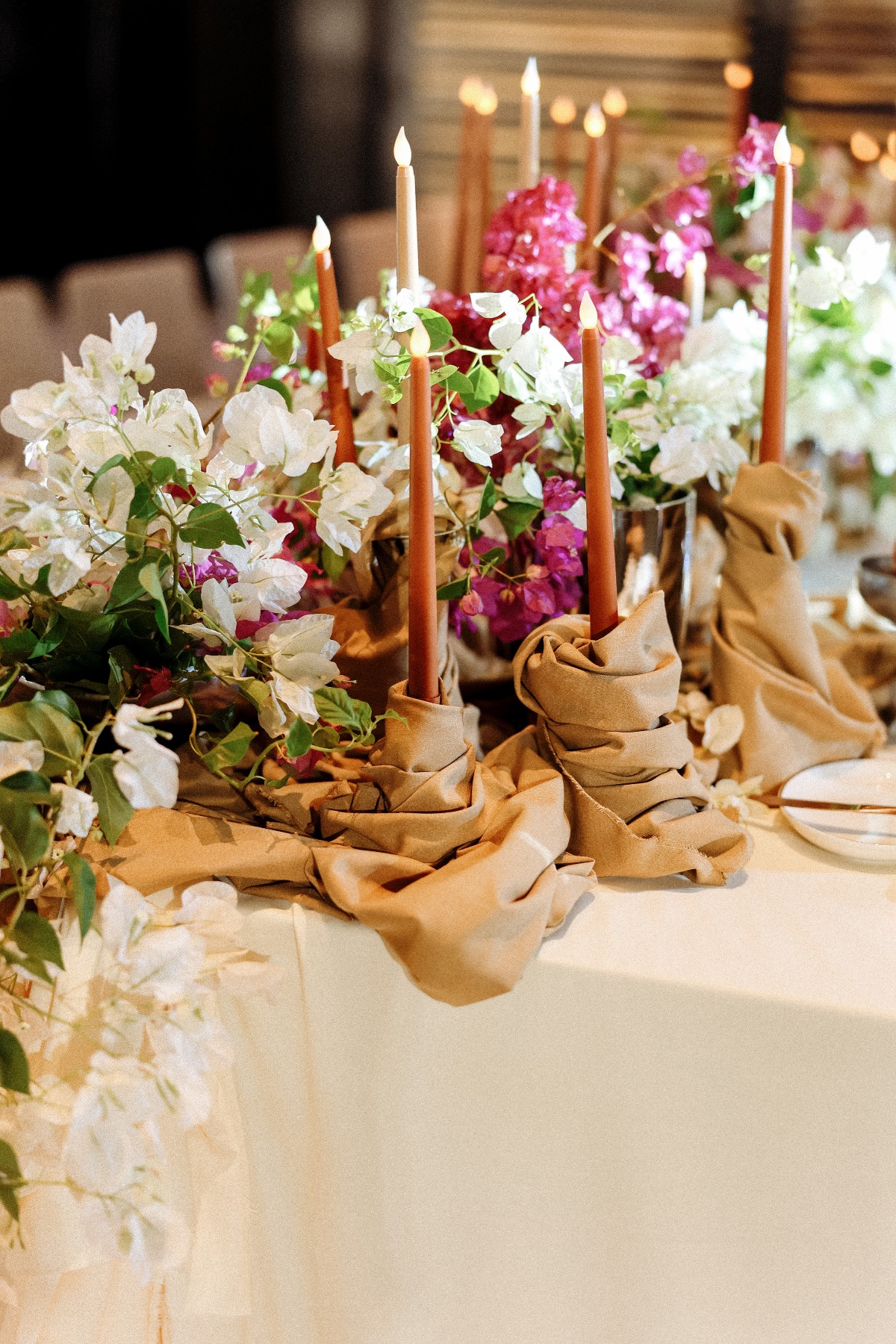 tapered candles wrapped in linens