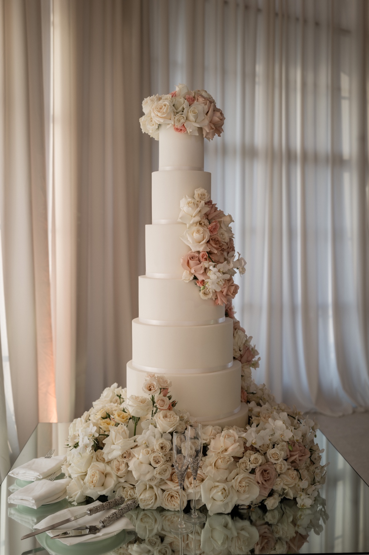white and off-white rose wedding cake