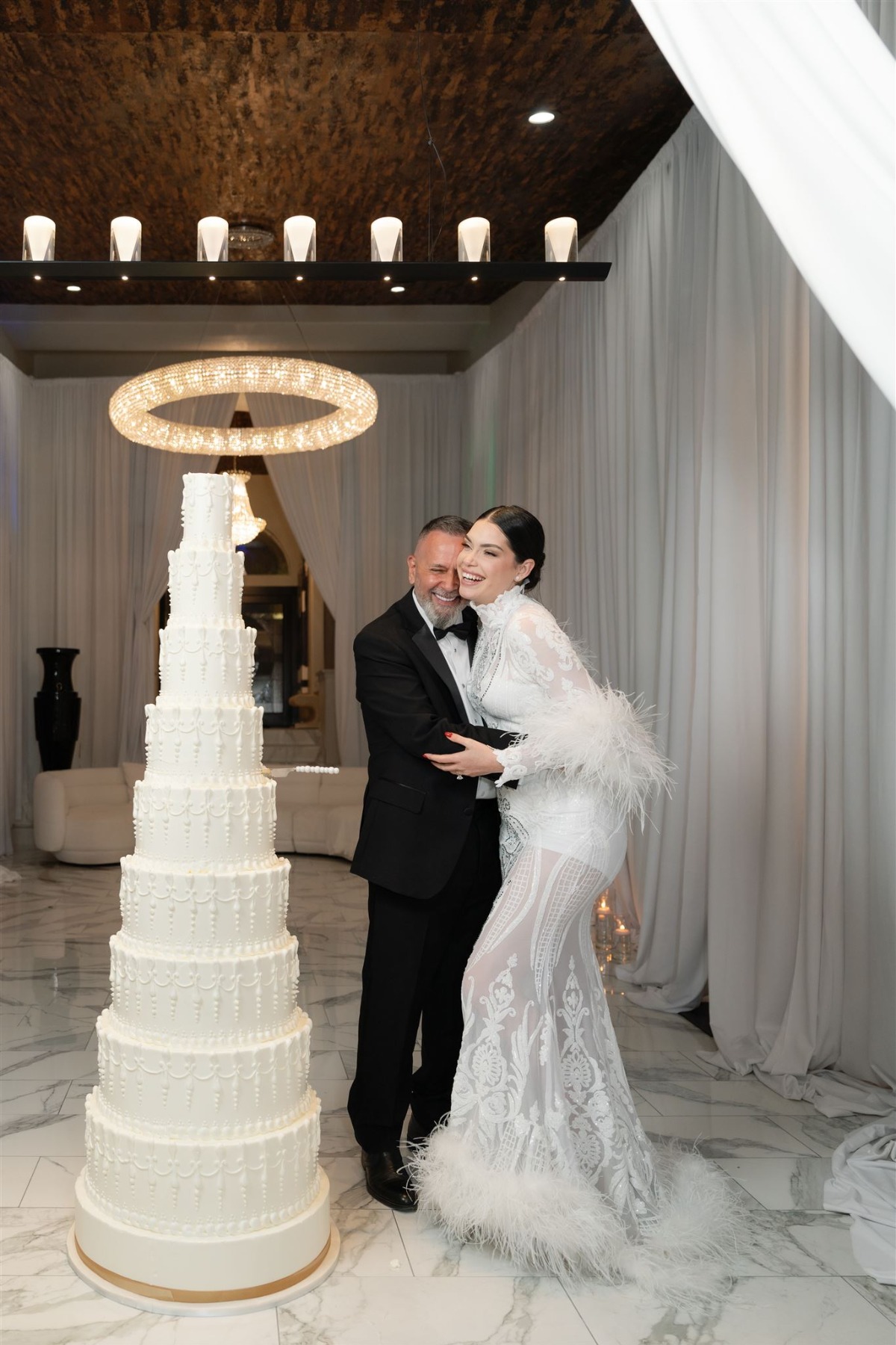 feather-trimmed reception dress