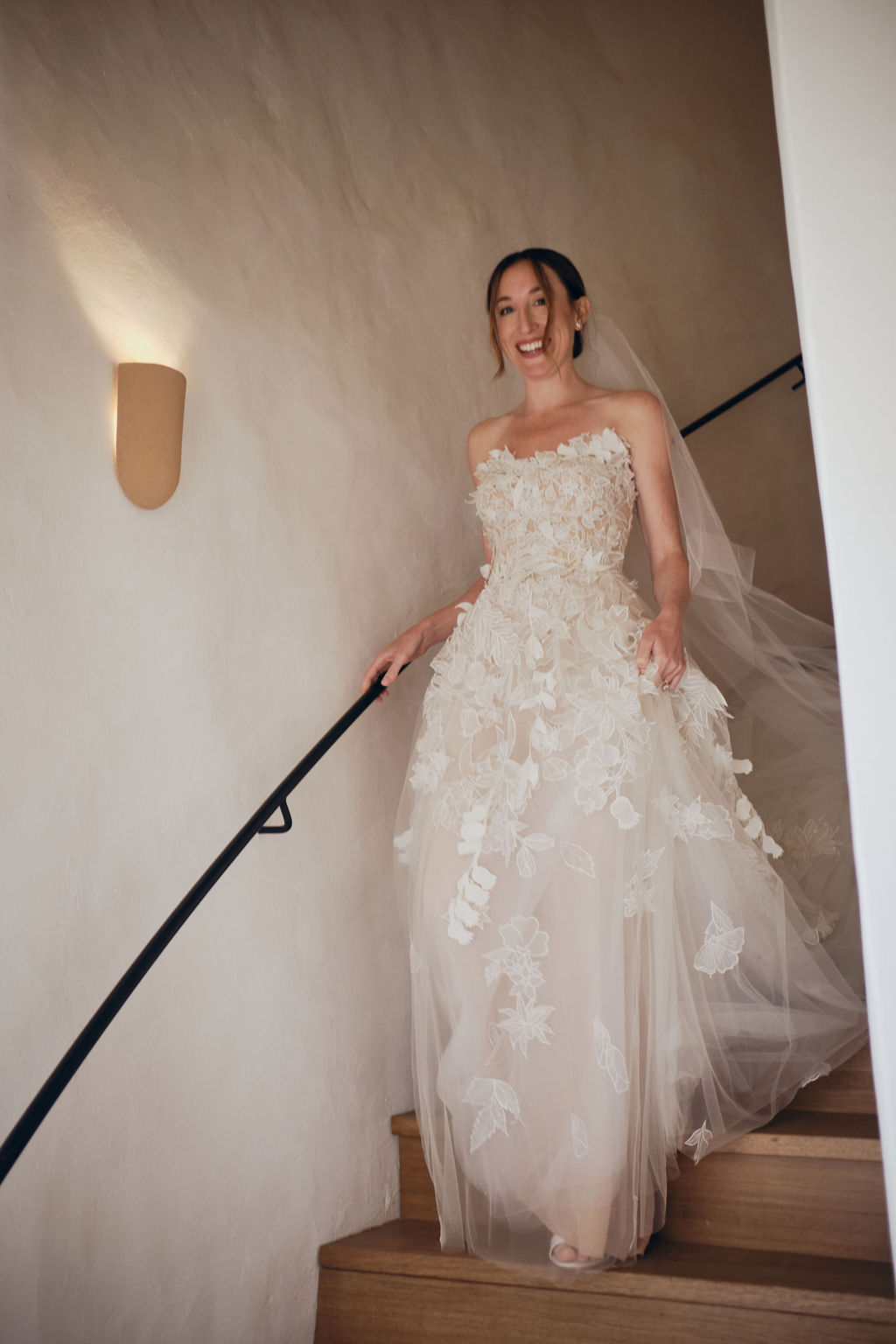 bride in oscar de la renta lace ballgown