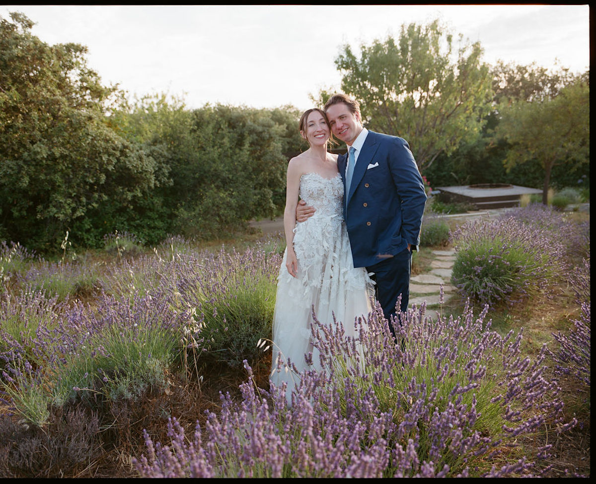 bride and groom in lavender field