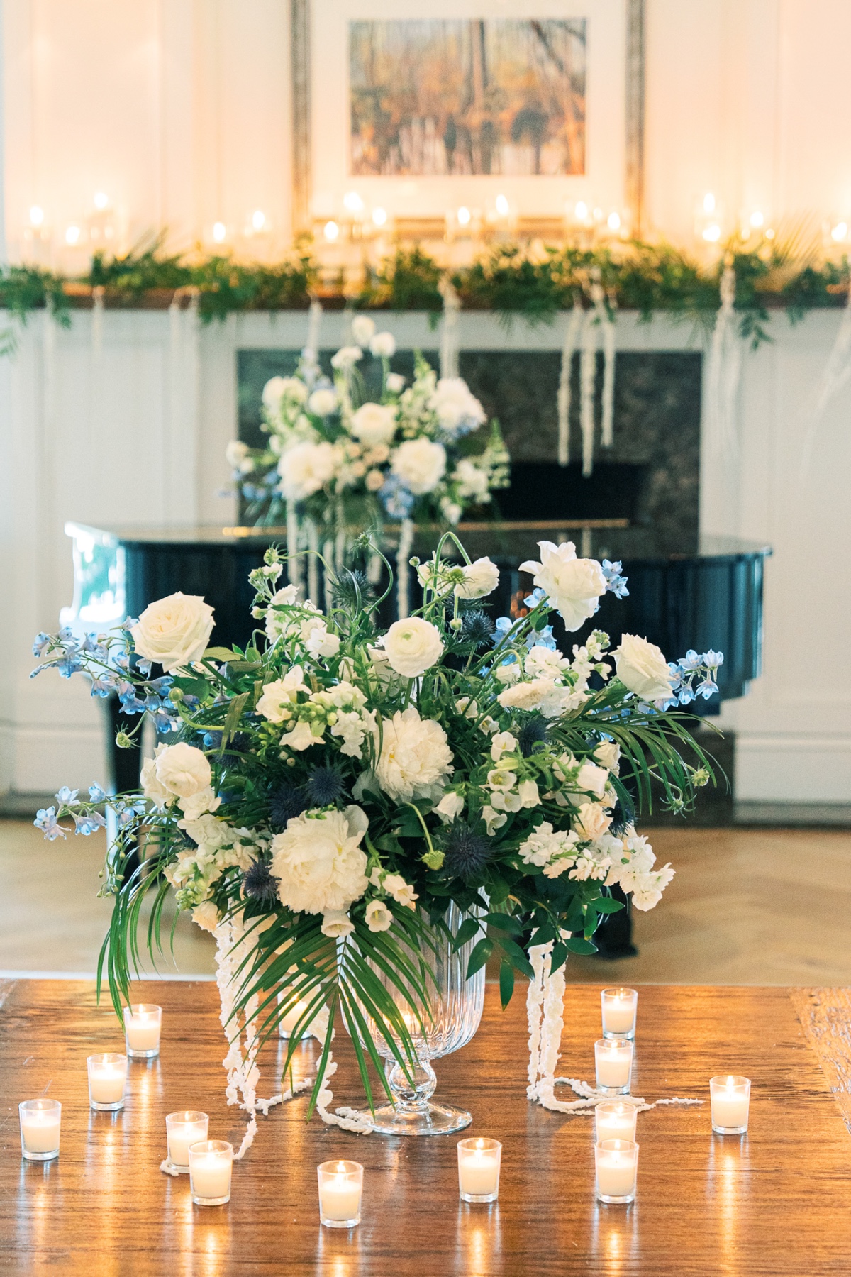 white and palm frond floral arrangements