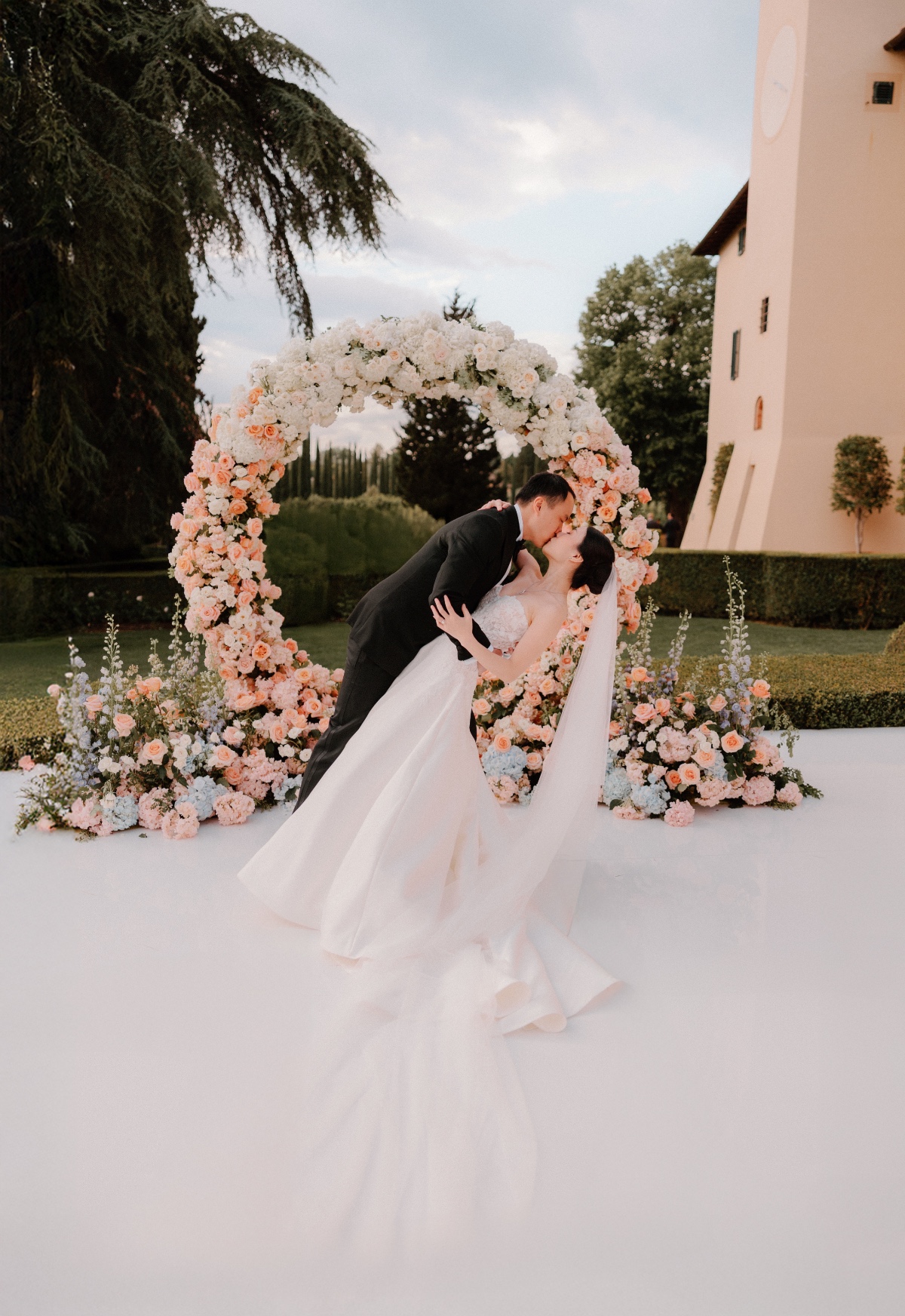 pink and blue floral arch