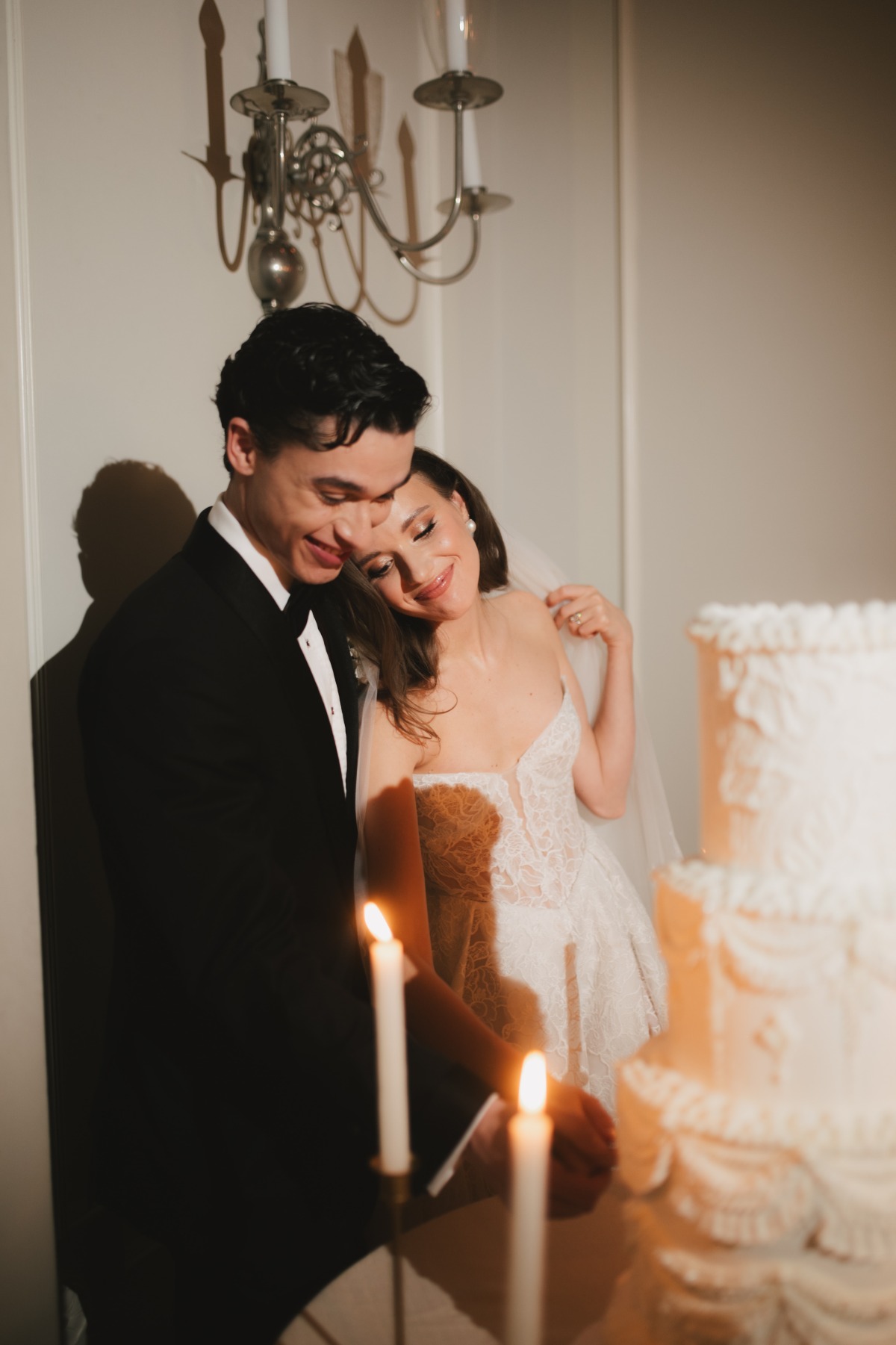 couple cutting wedding cake