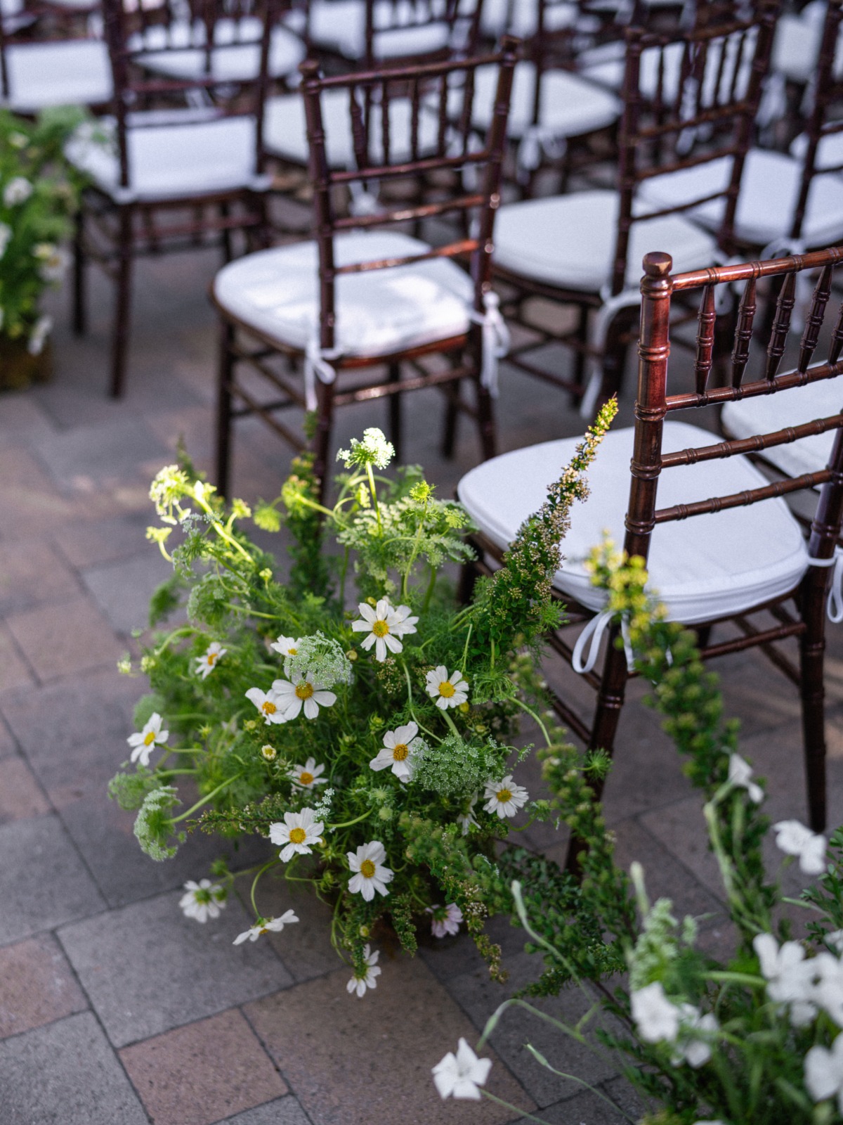 wildflower aisle arrangements