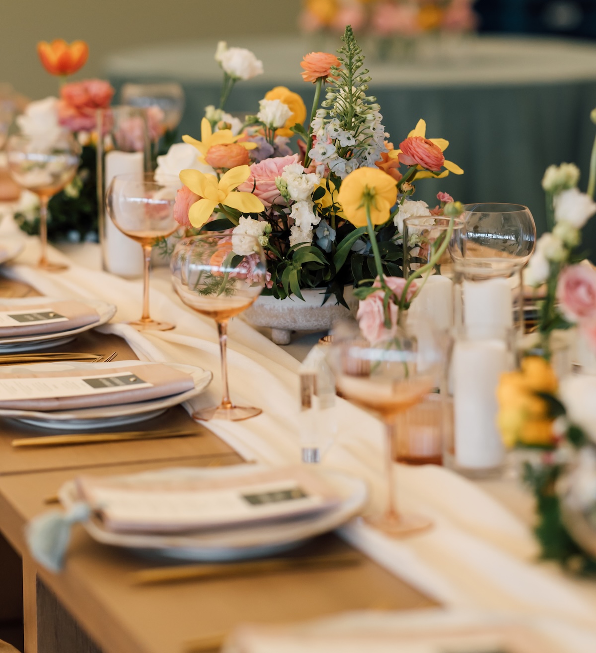 orange yellow pink and orange wedding reception