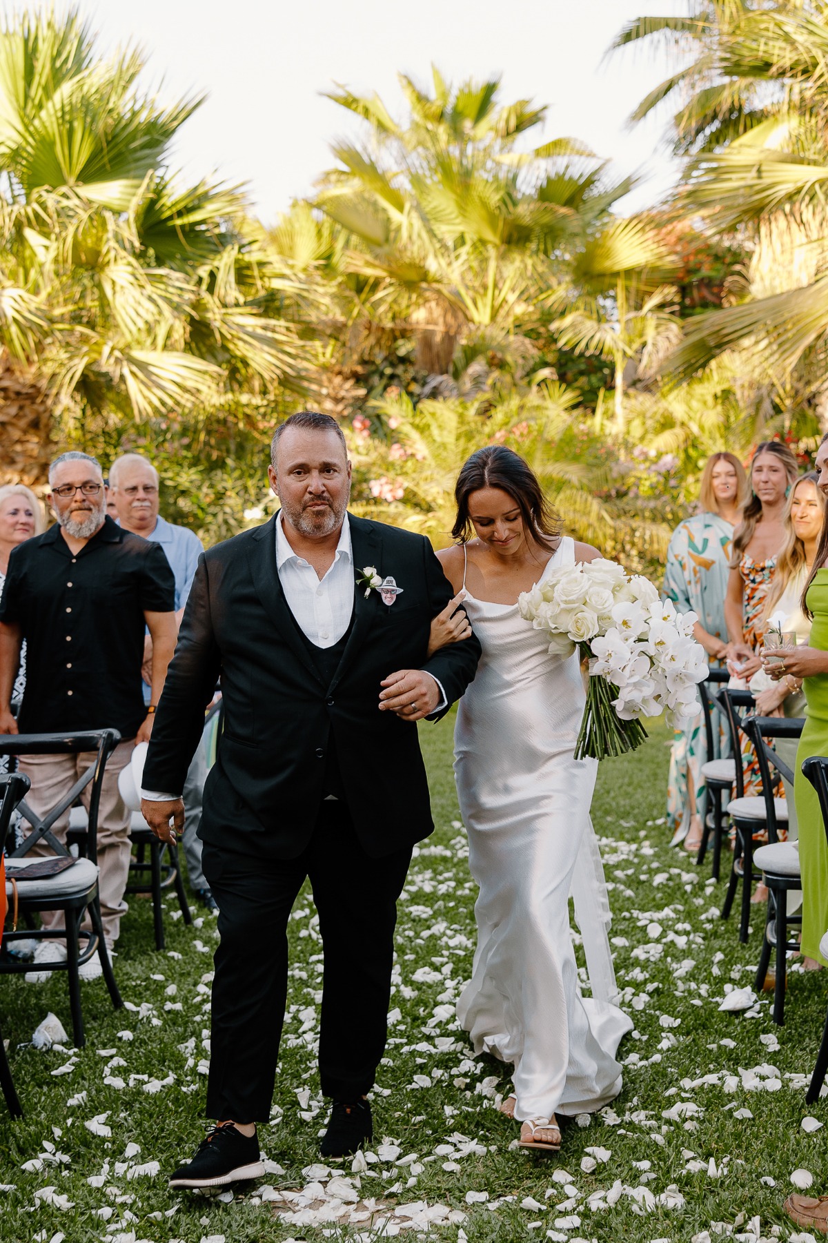 father of the bride walking her down the aisle