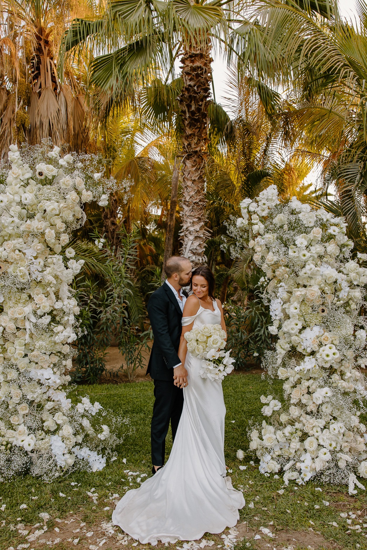 modern white floral arch for wedding