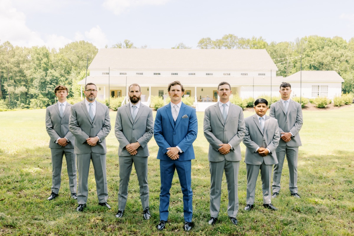 gray groomsmen suits with blue ties