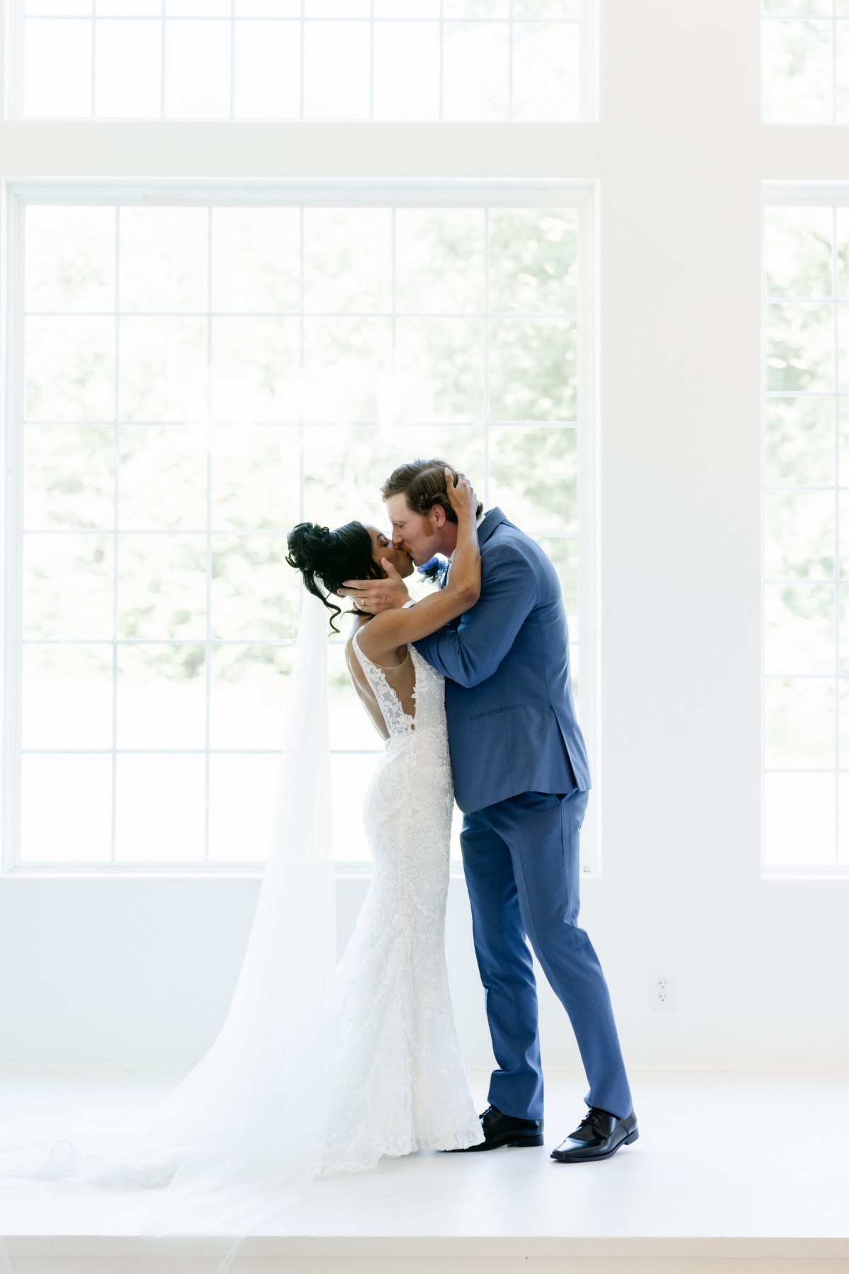 all-white wedding ceremony venue setting