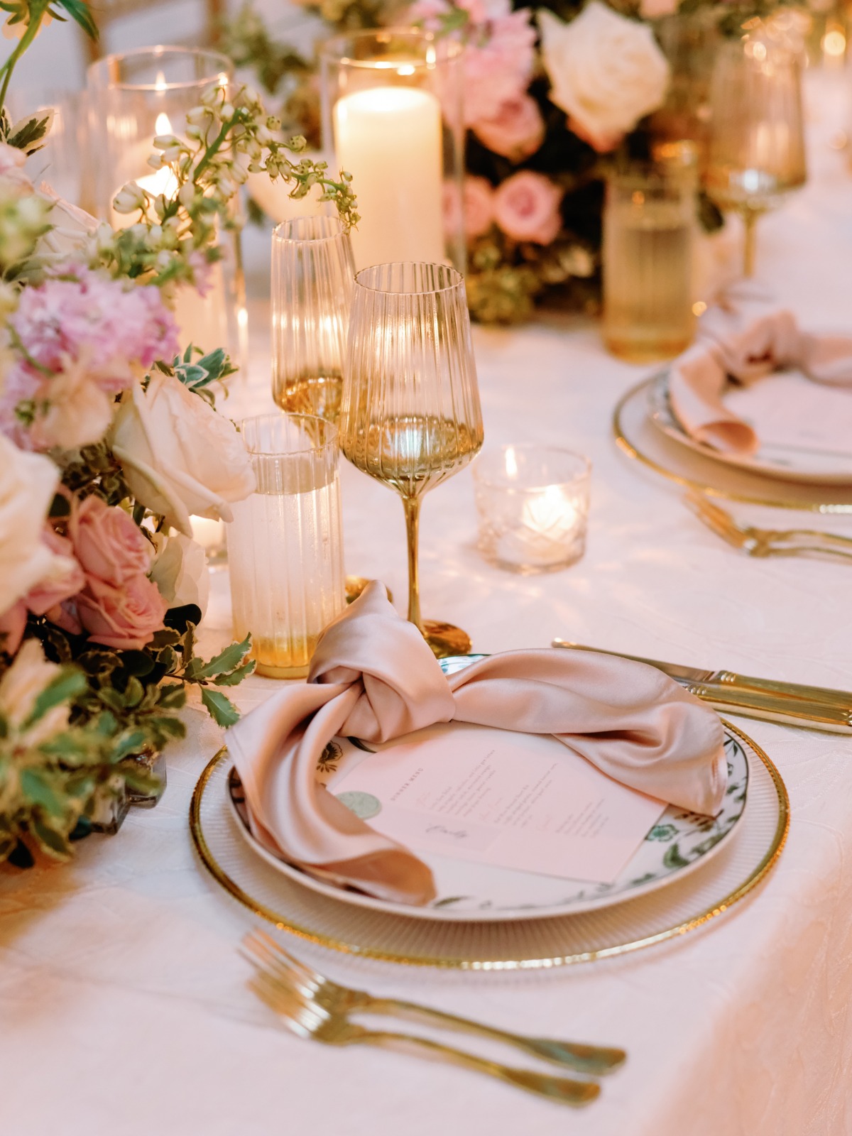 wedding place setting with cadles and flowers