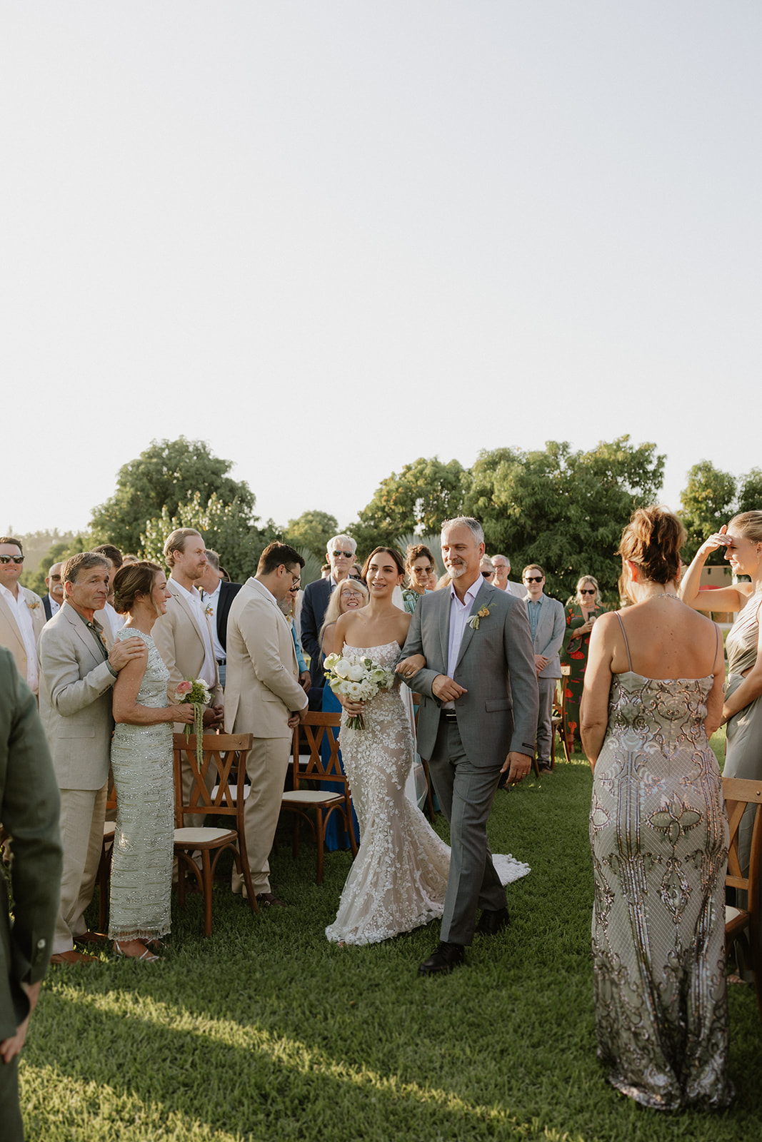 father walking bride down the aisle