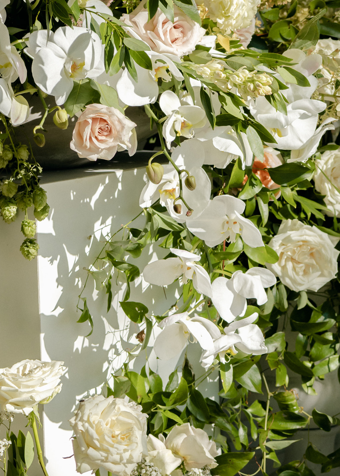 orchid and rose floral towers for wedding
