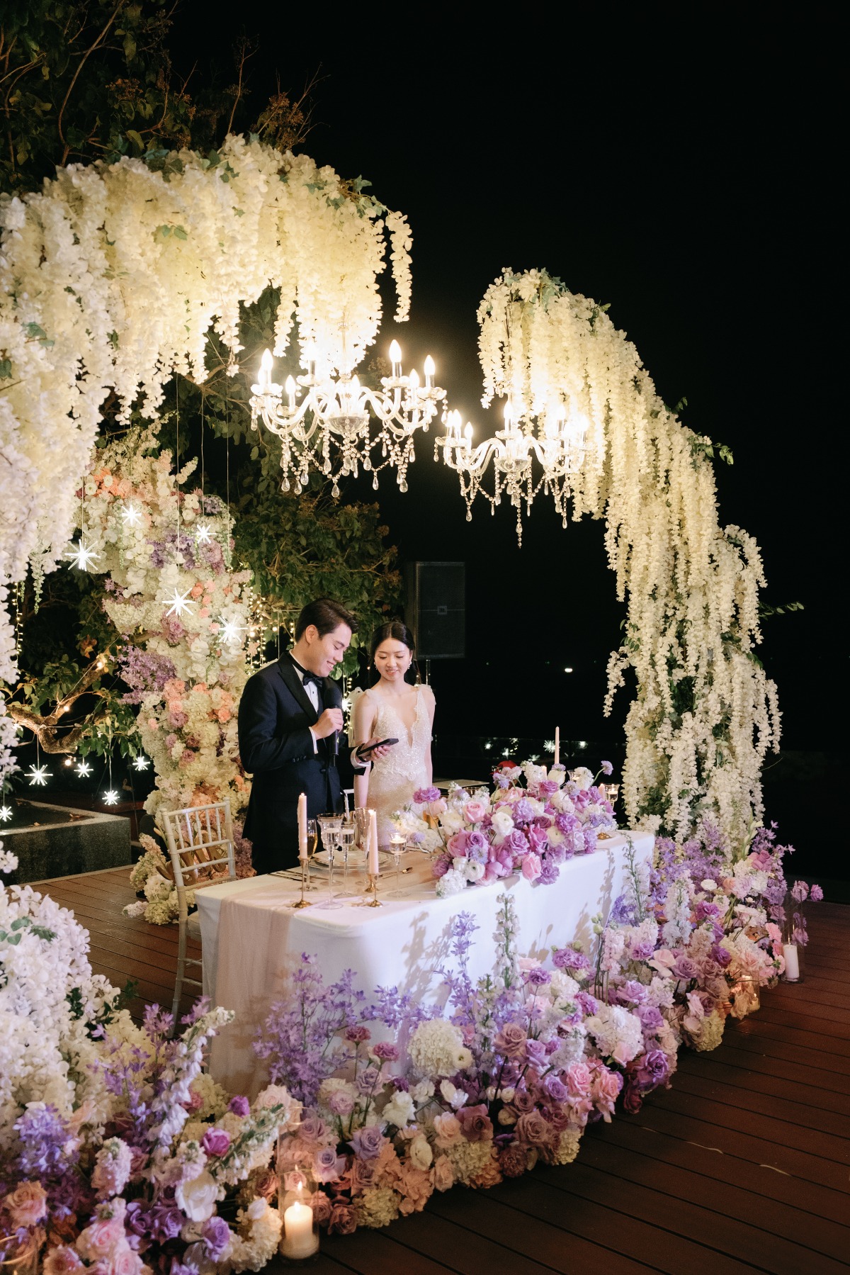 outdoor chandelier wedding reception lighting