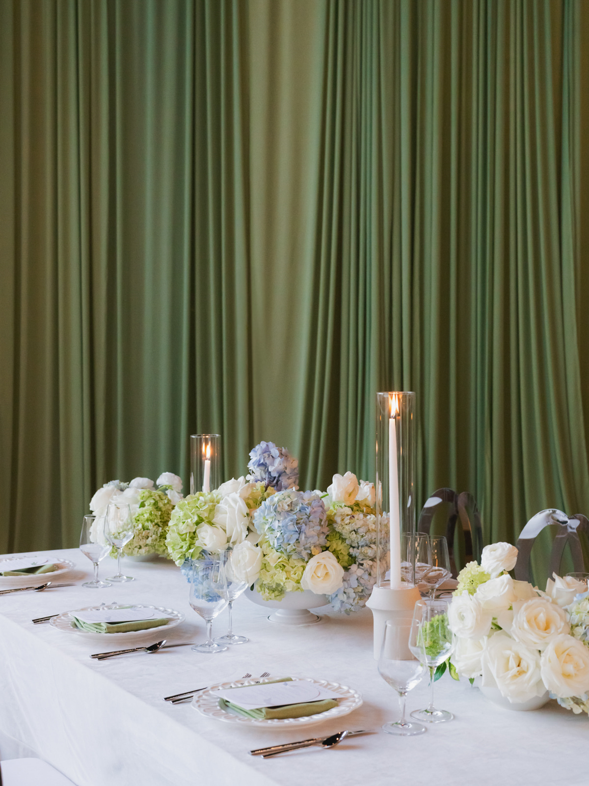 green and blue draped wedding decor