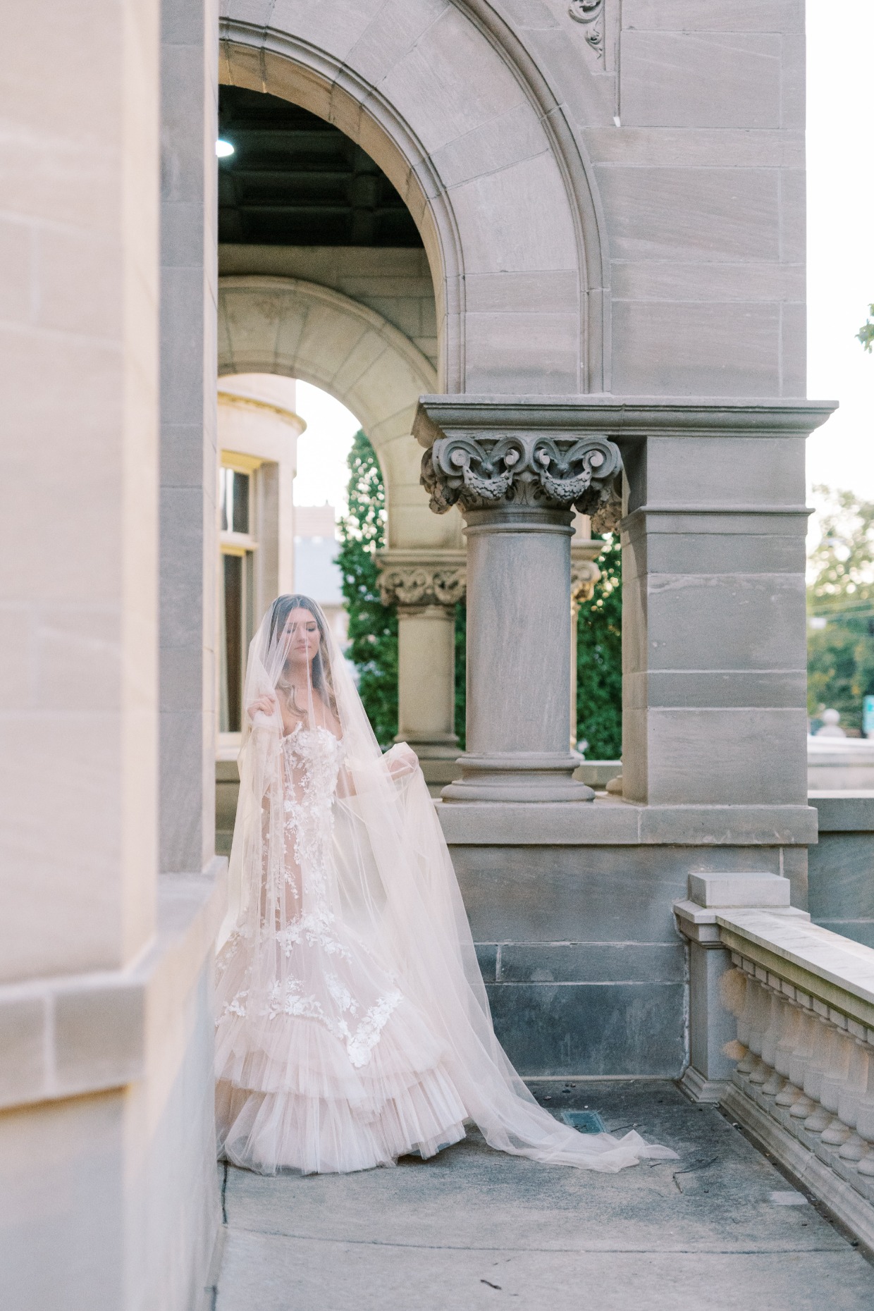bride in champagne dress and veil by galia lahav