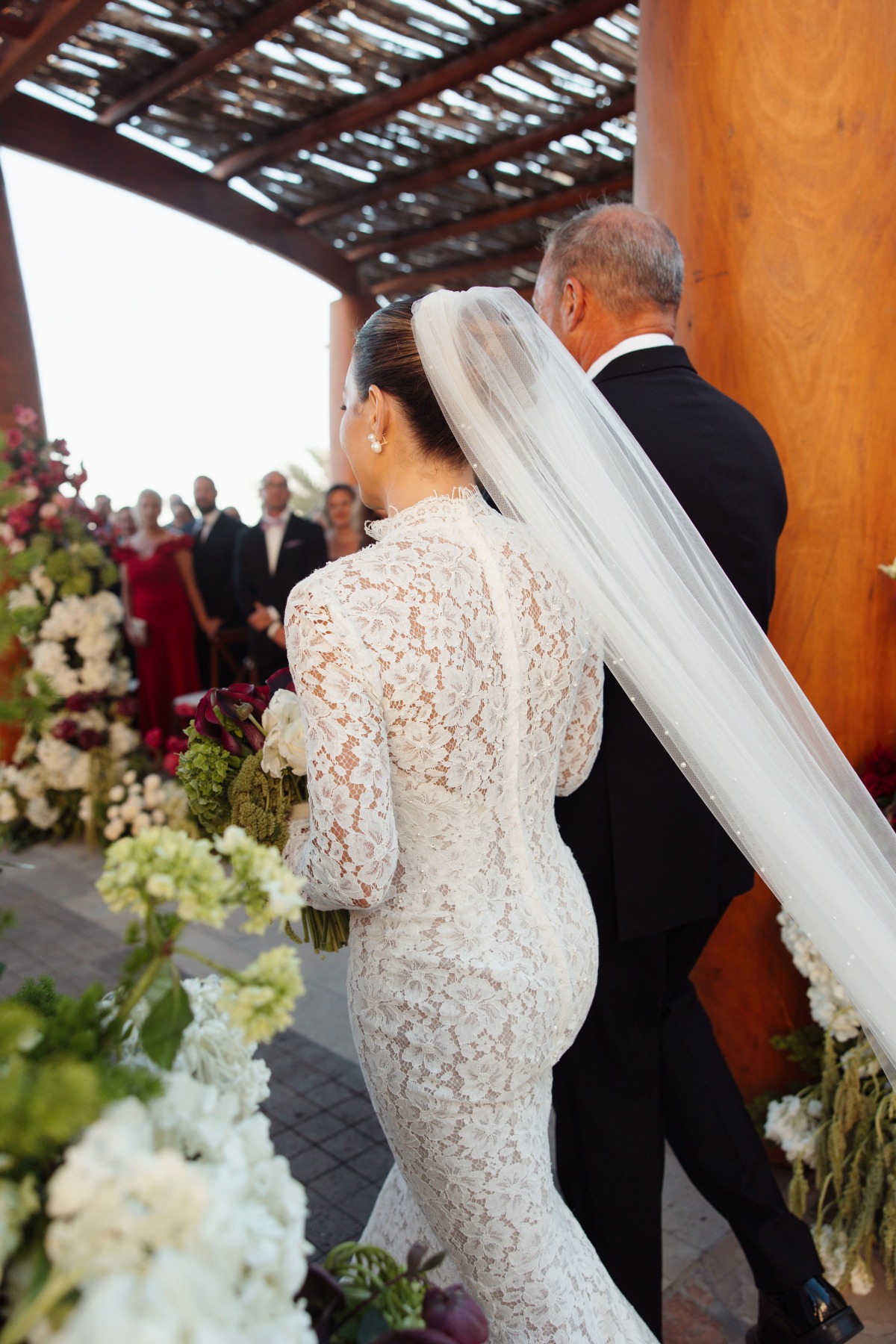 bride walking down the aisle with father
