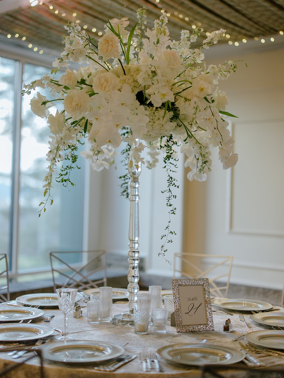 tall white floral centerpieces for wedding reception