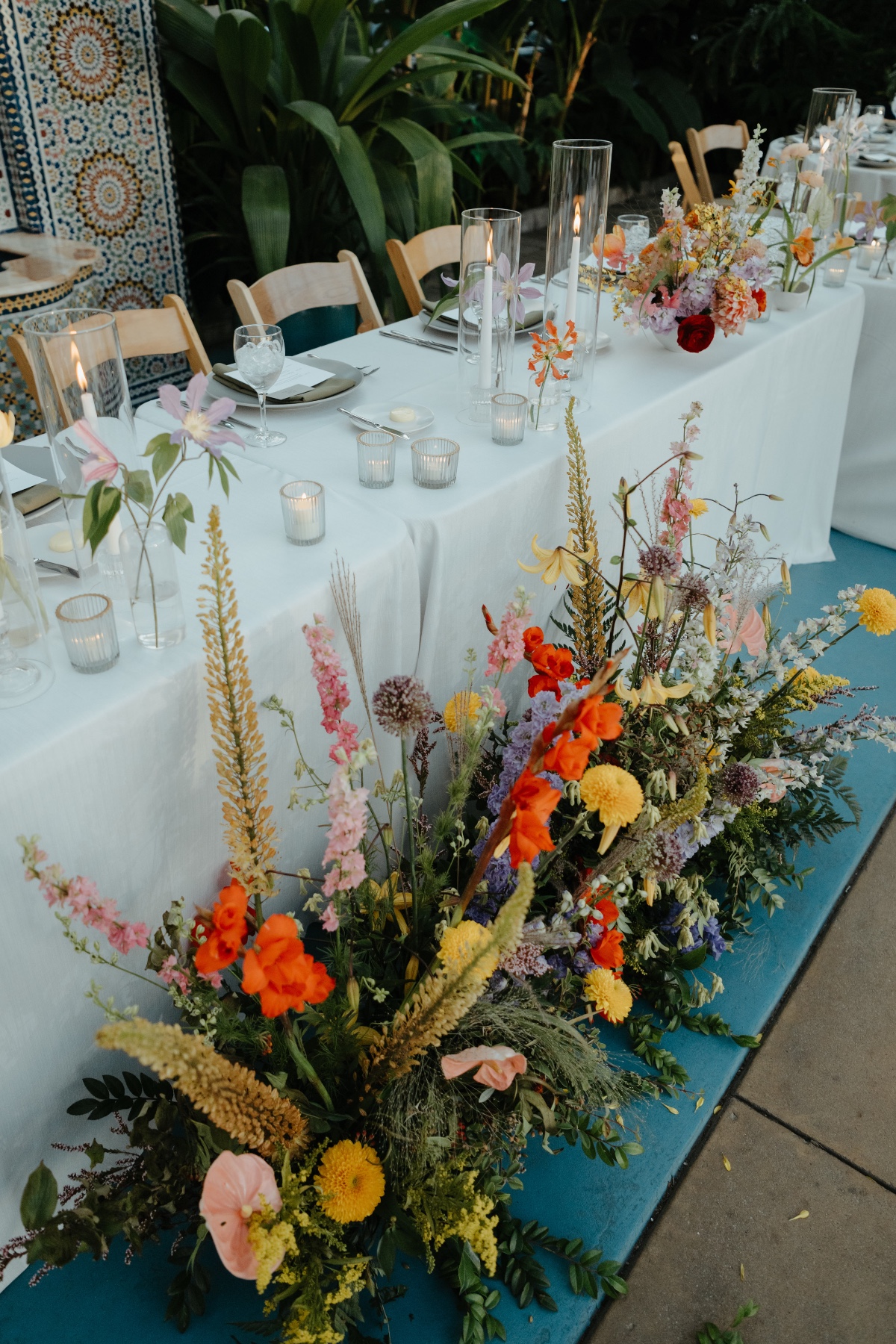 tropical wedding floor level floral arrangements