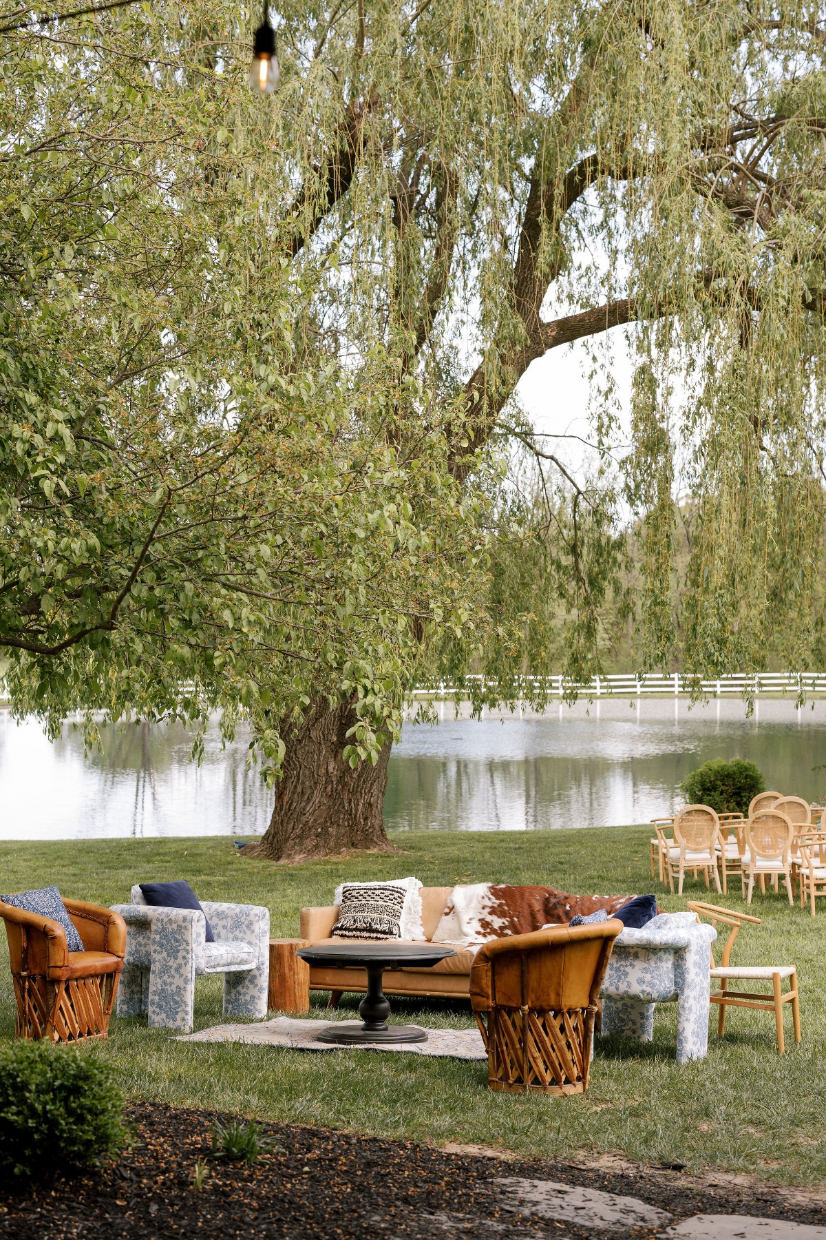 outdoor lounge by lake for wedding