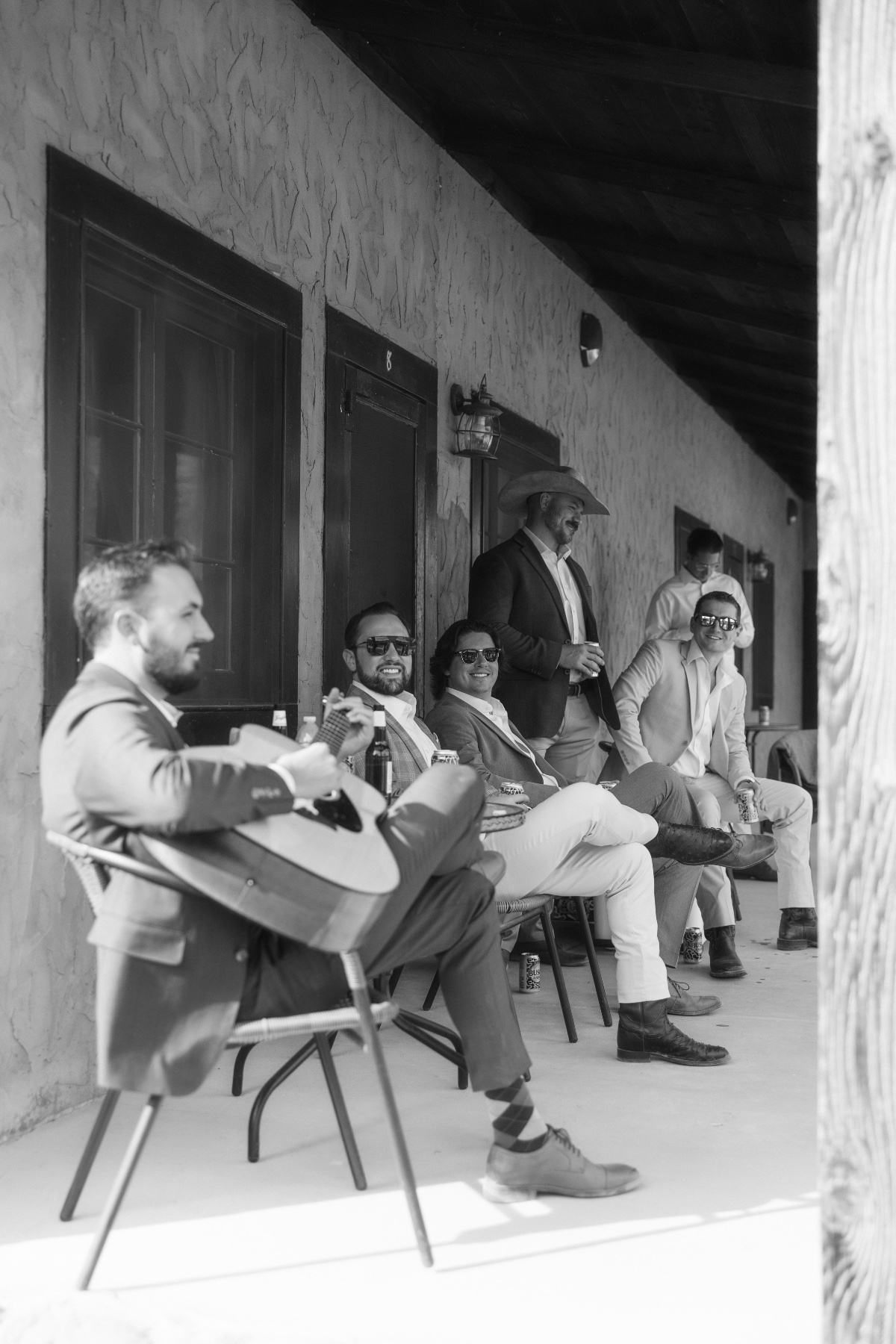 groom playing guitar