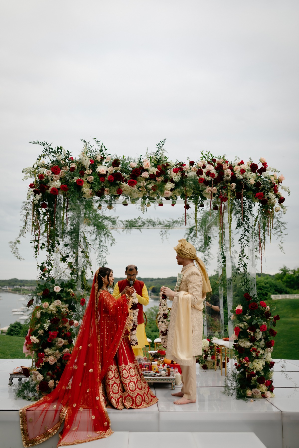 red and white floral arch installation