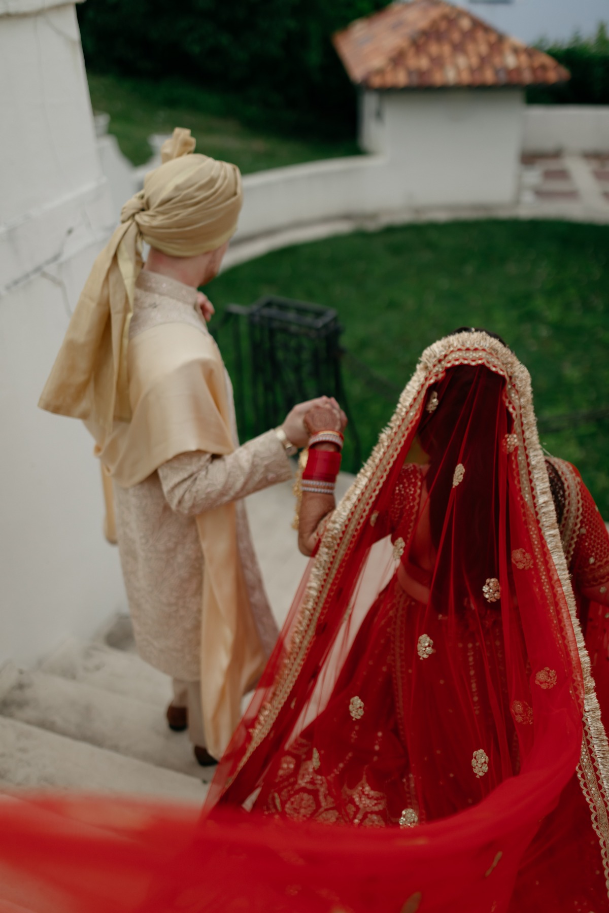 red and gold Indian bride attire