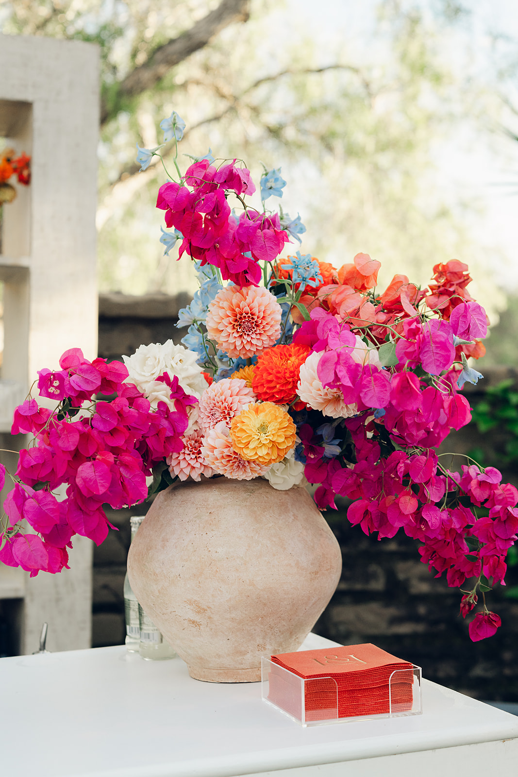 vibrant floral arrangement for wedding bar