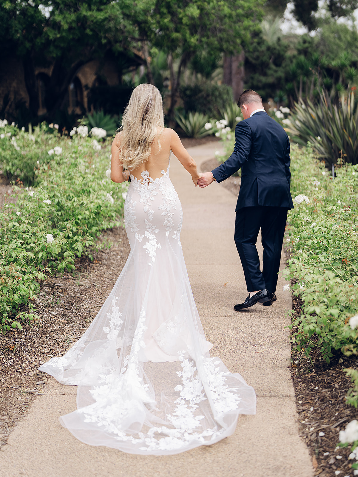 dramatic lace train on wedding gown