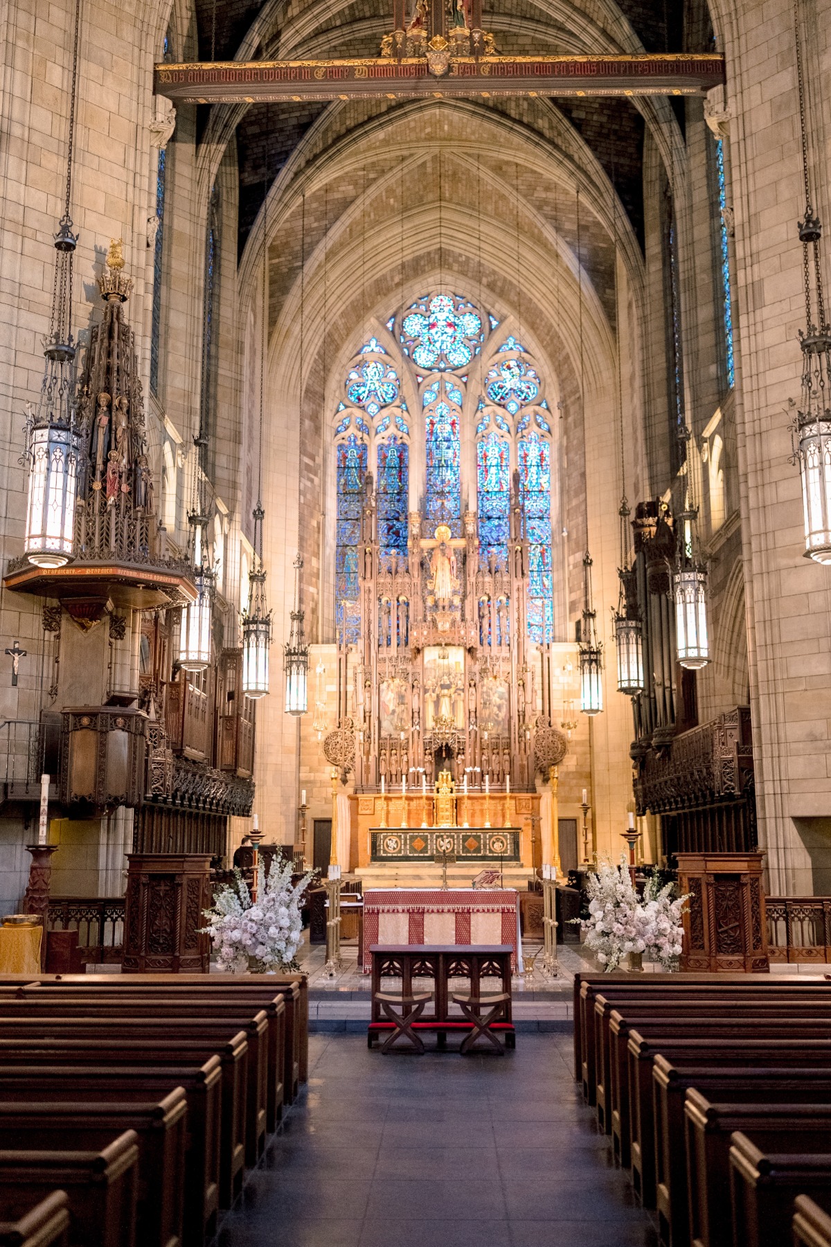 large rose flower arrangements for cathedral wedding