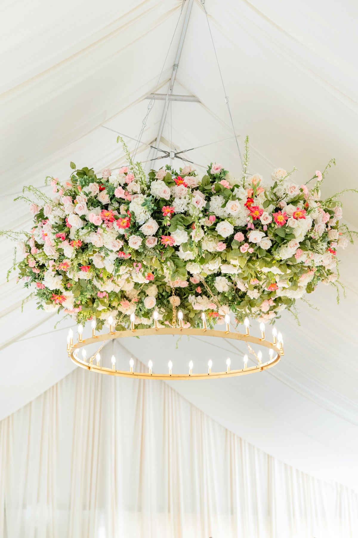 hanging floral installation for tented reception