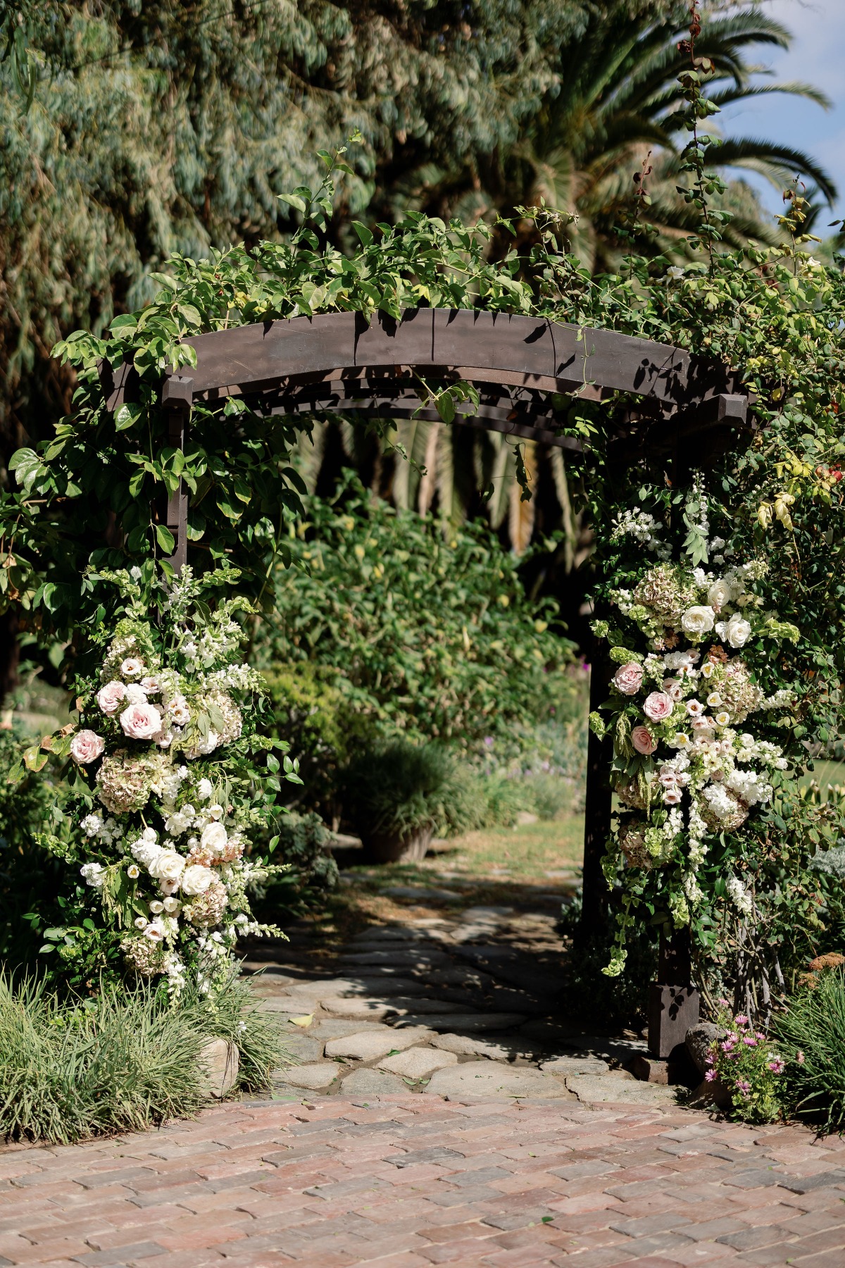 large pale pink rose ceremony columns
