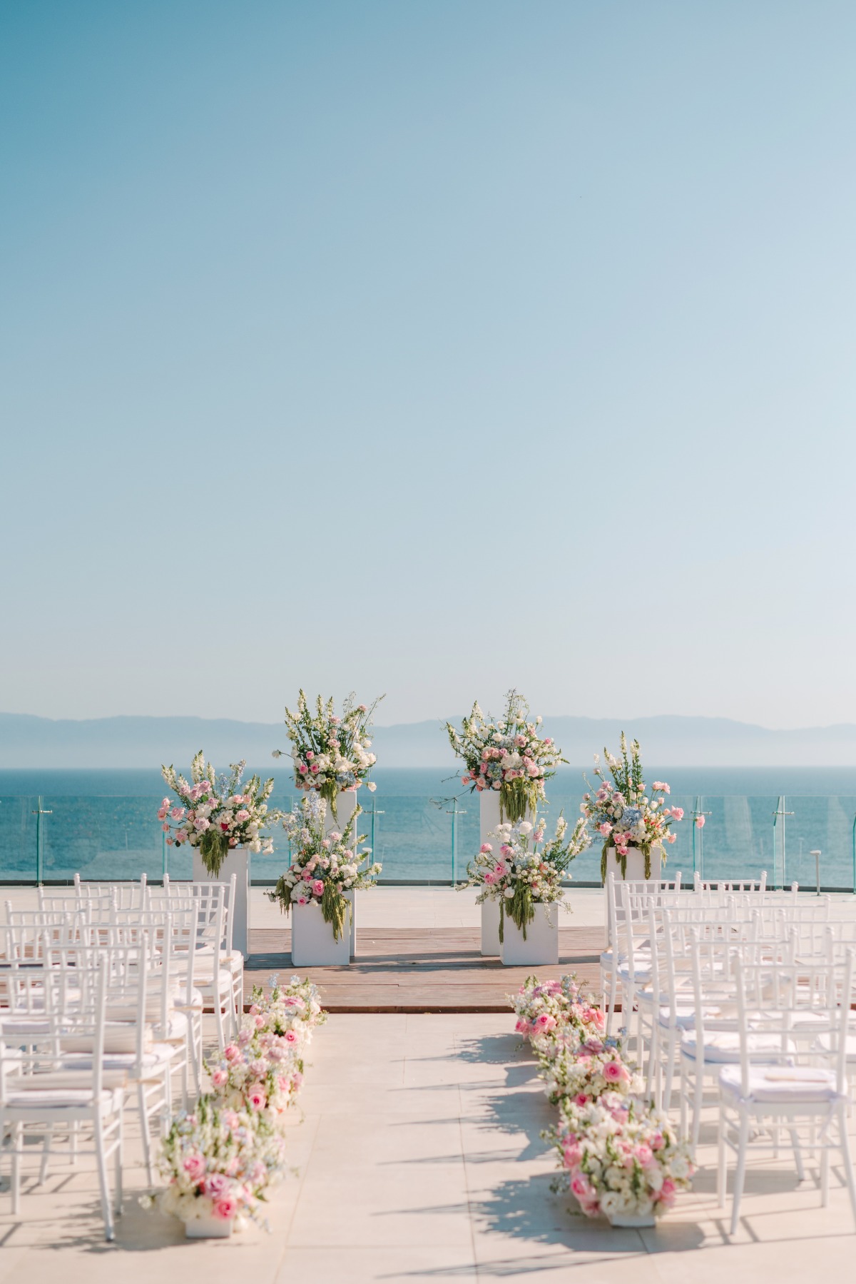 pink white and dripping green floral arrangements