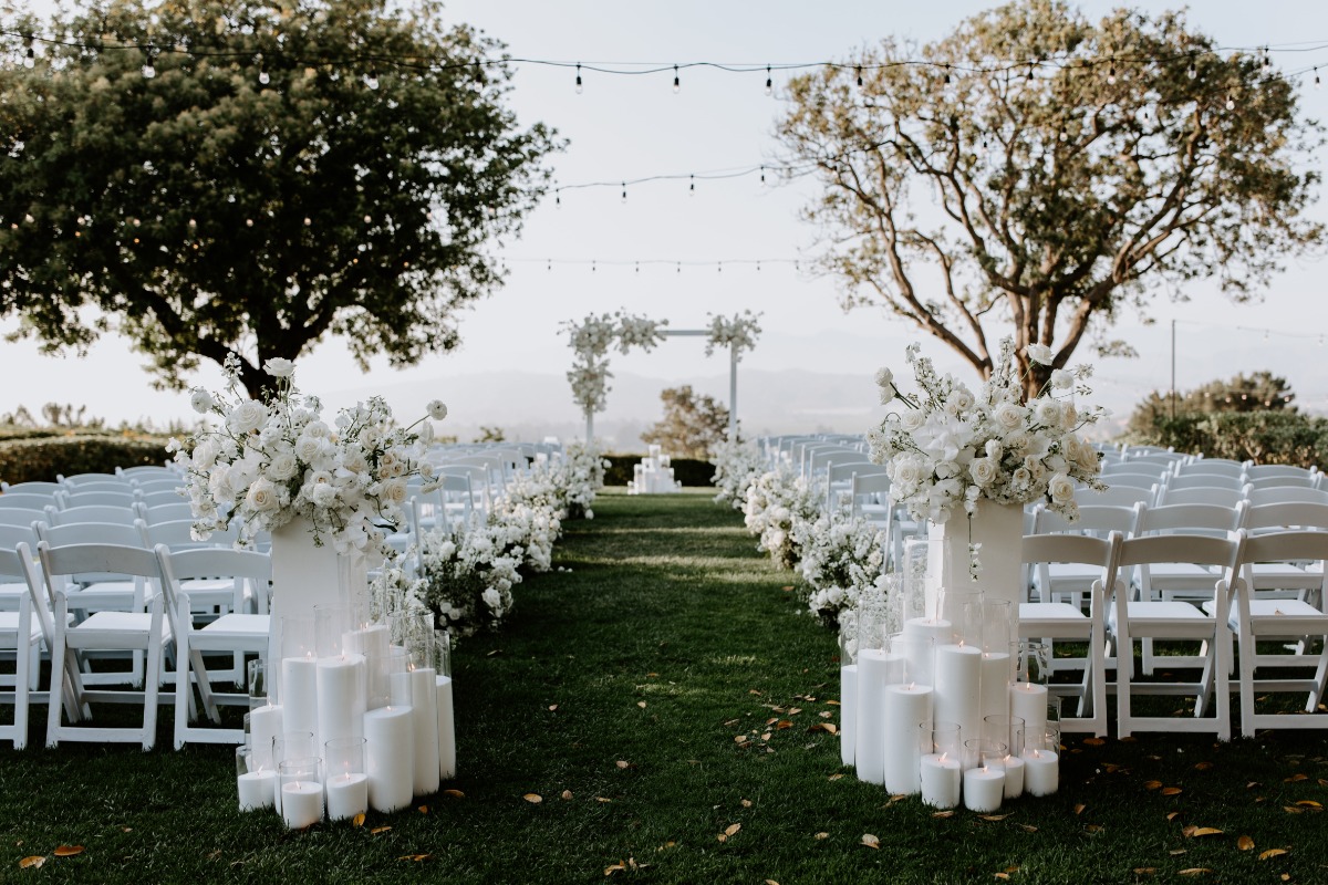 all white wedding ceremony flowers