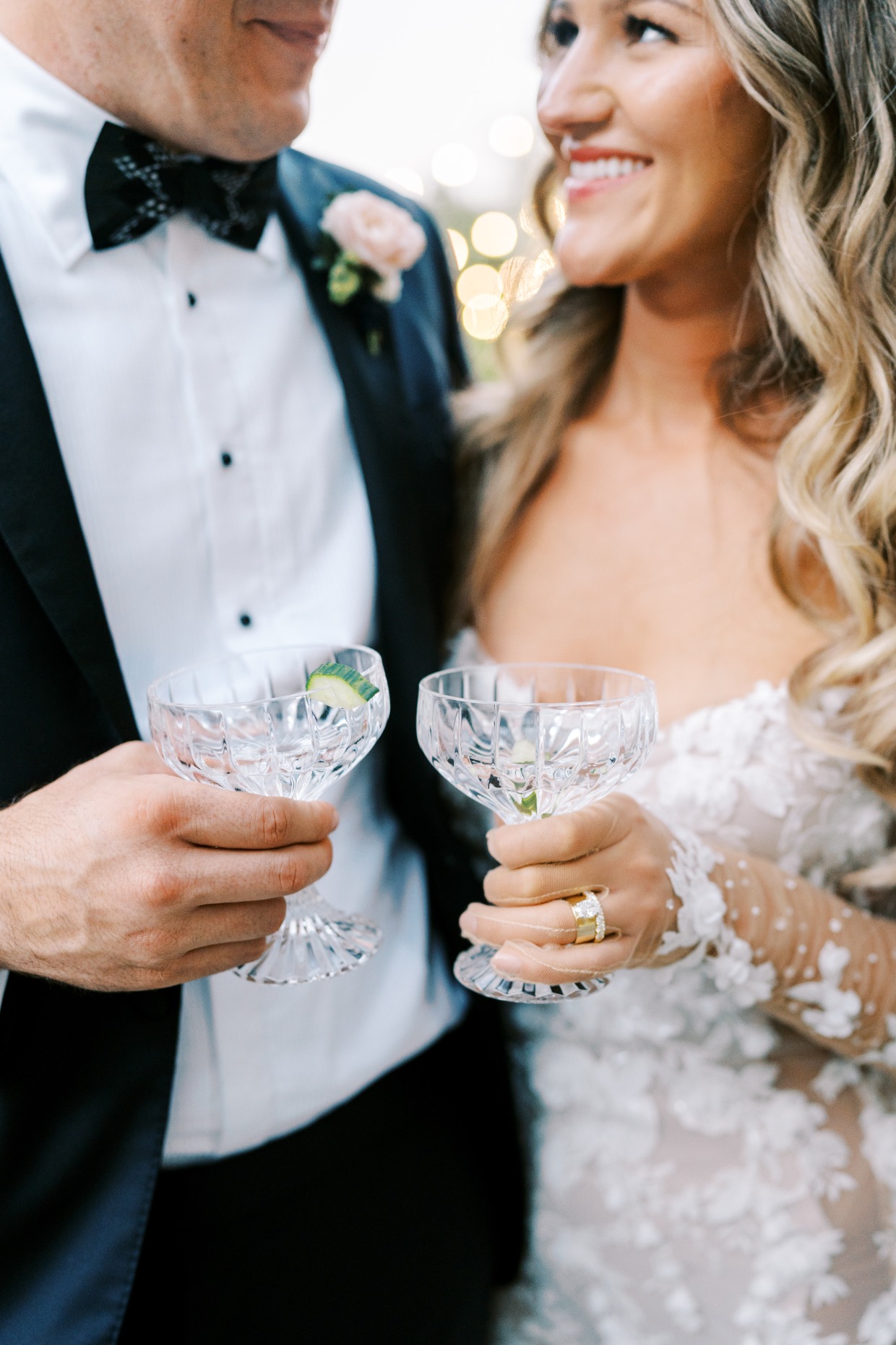couple toasting with bride in galia lahav