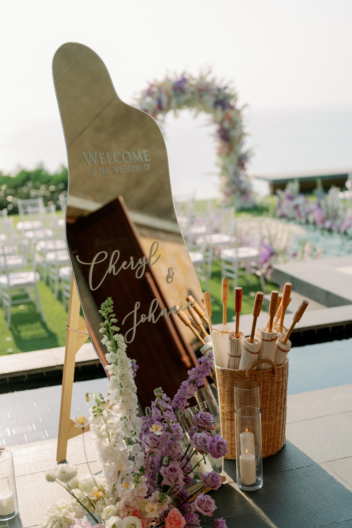 mirrored welcome sign and parasols