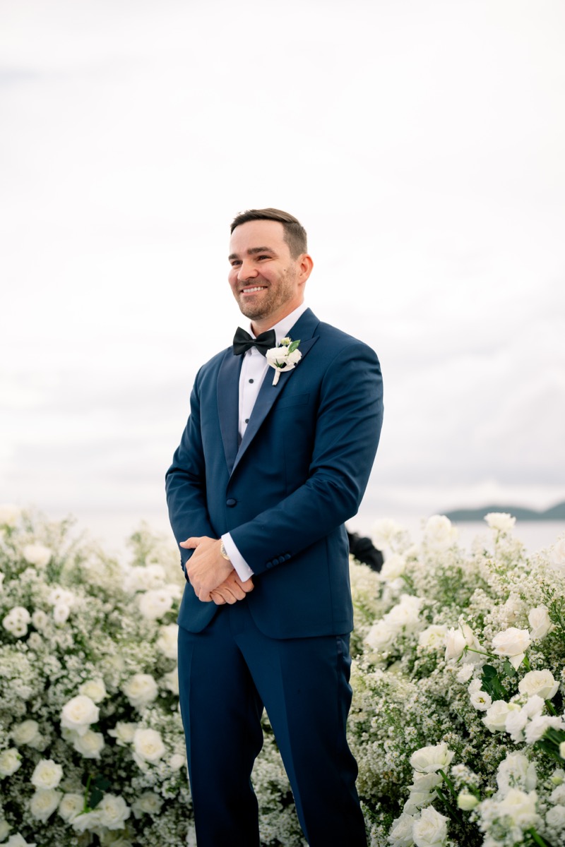 groom in blue suit