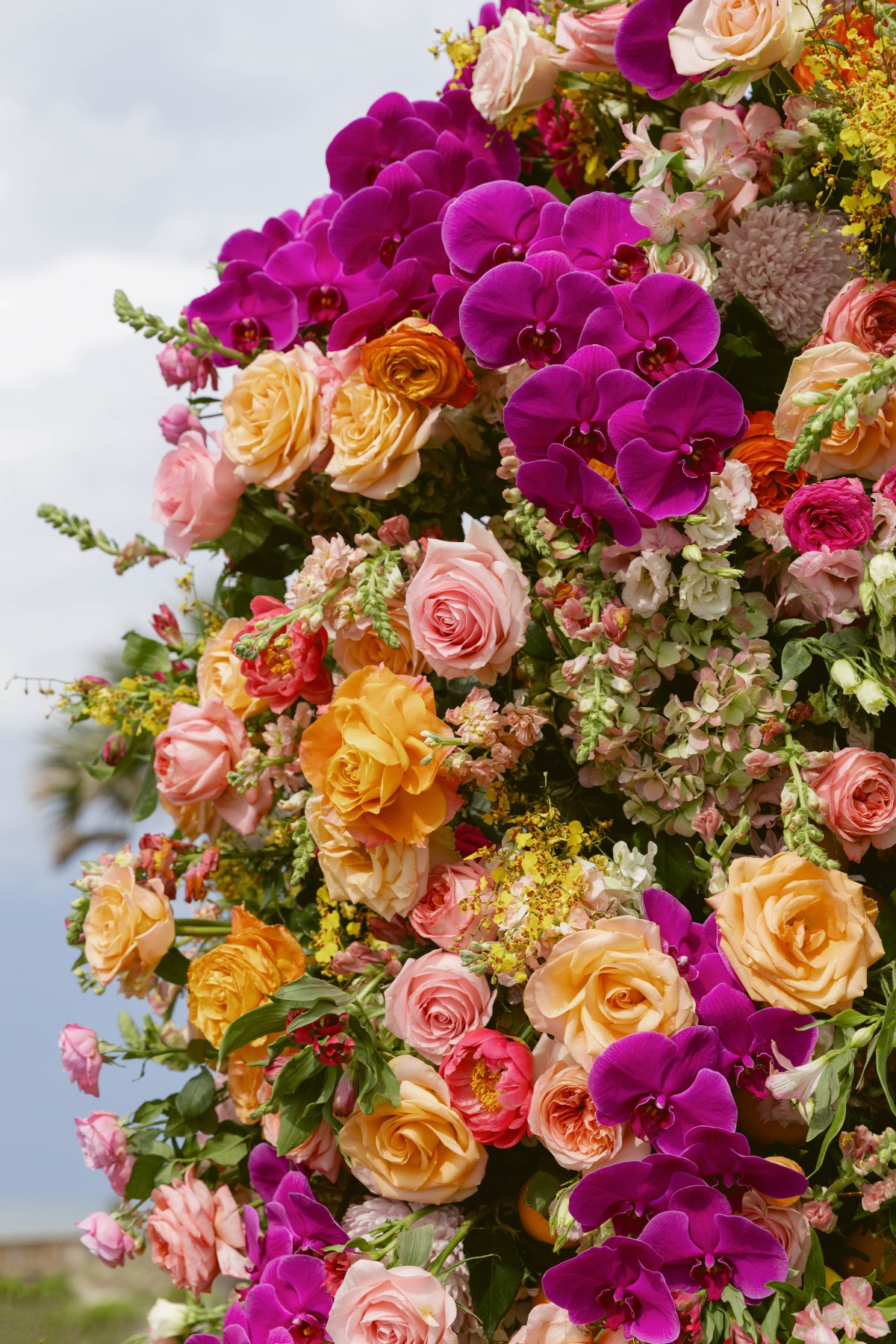 magenta blush and orange wedding flowers