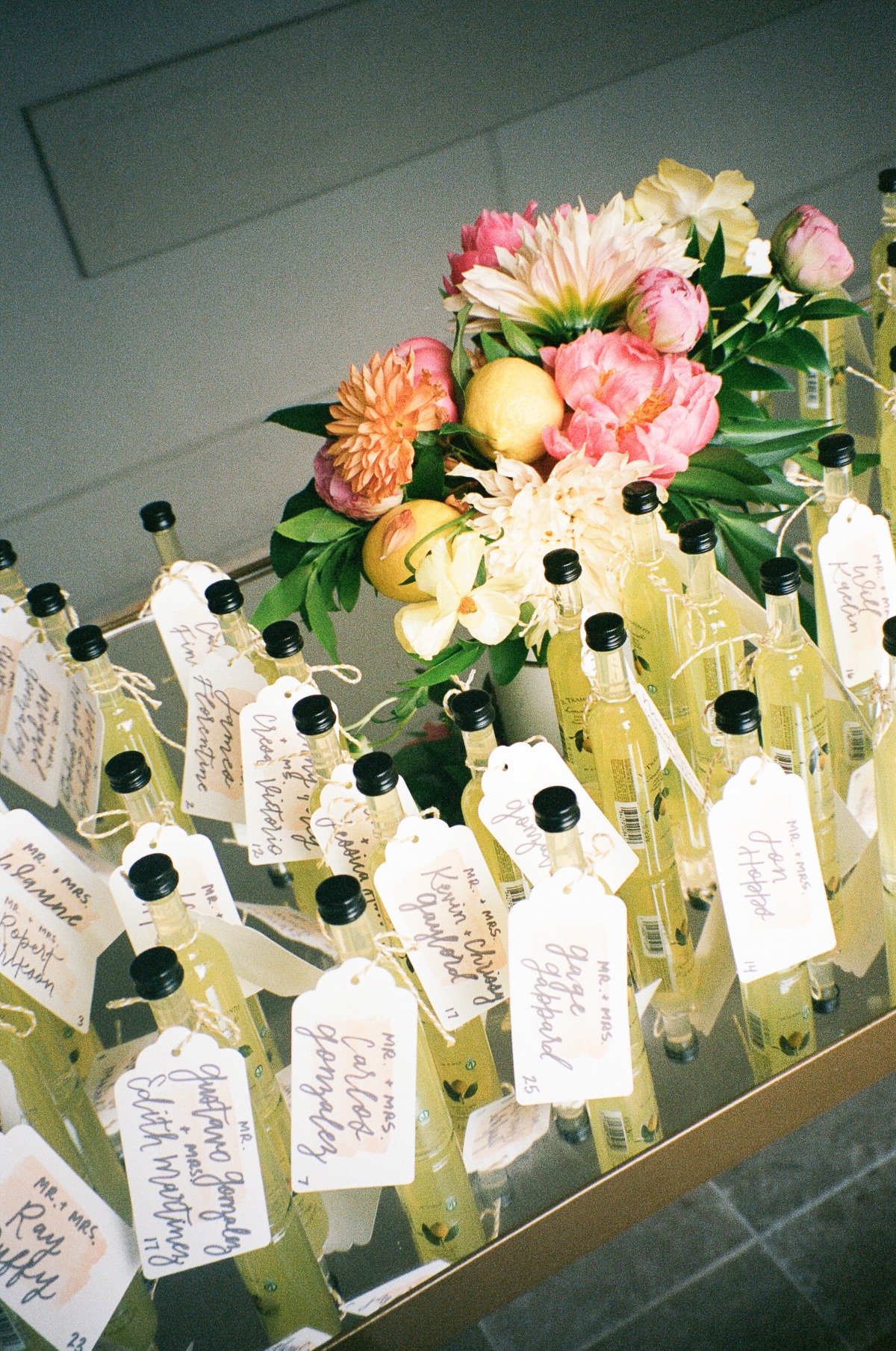 limoncello bottle favors and escort cards for wedding
