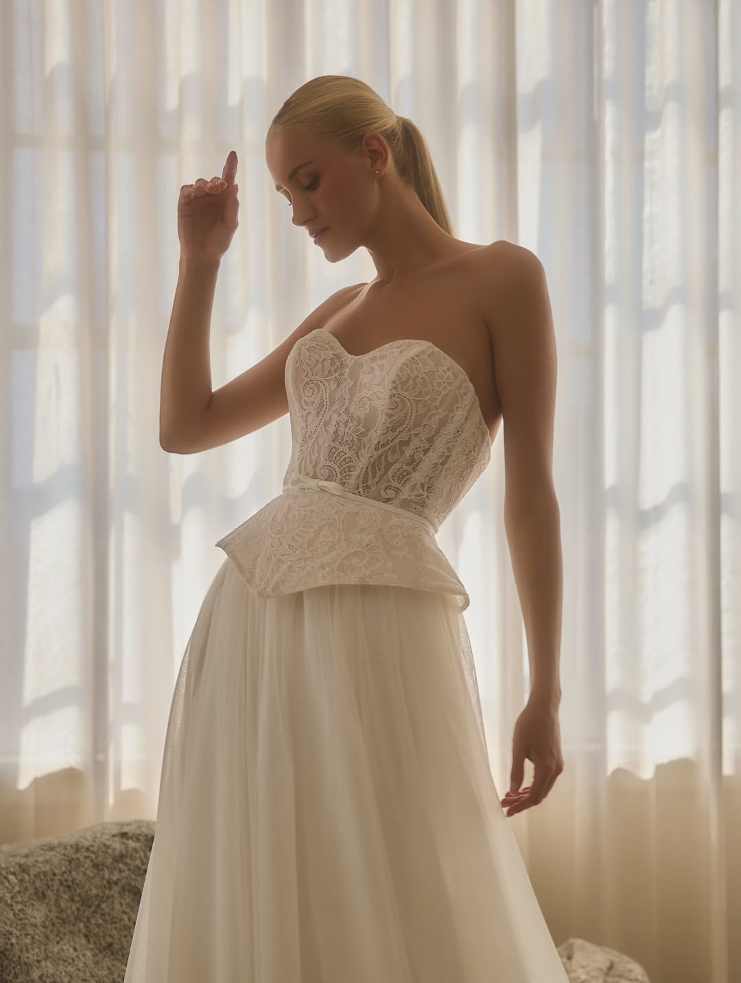 structured peplum gown by casablanca bridal