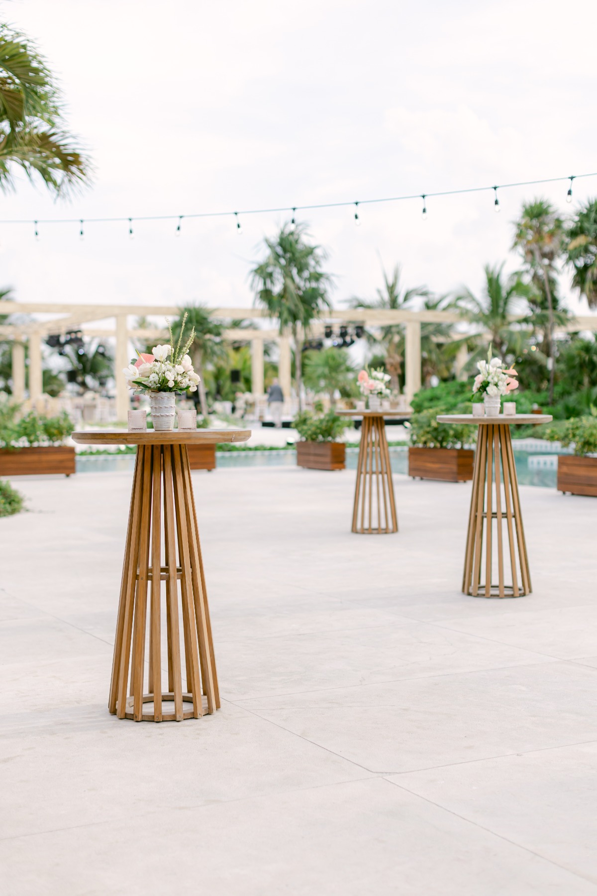 small wood tables cocktail hour