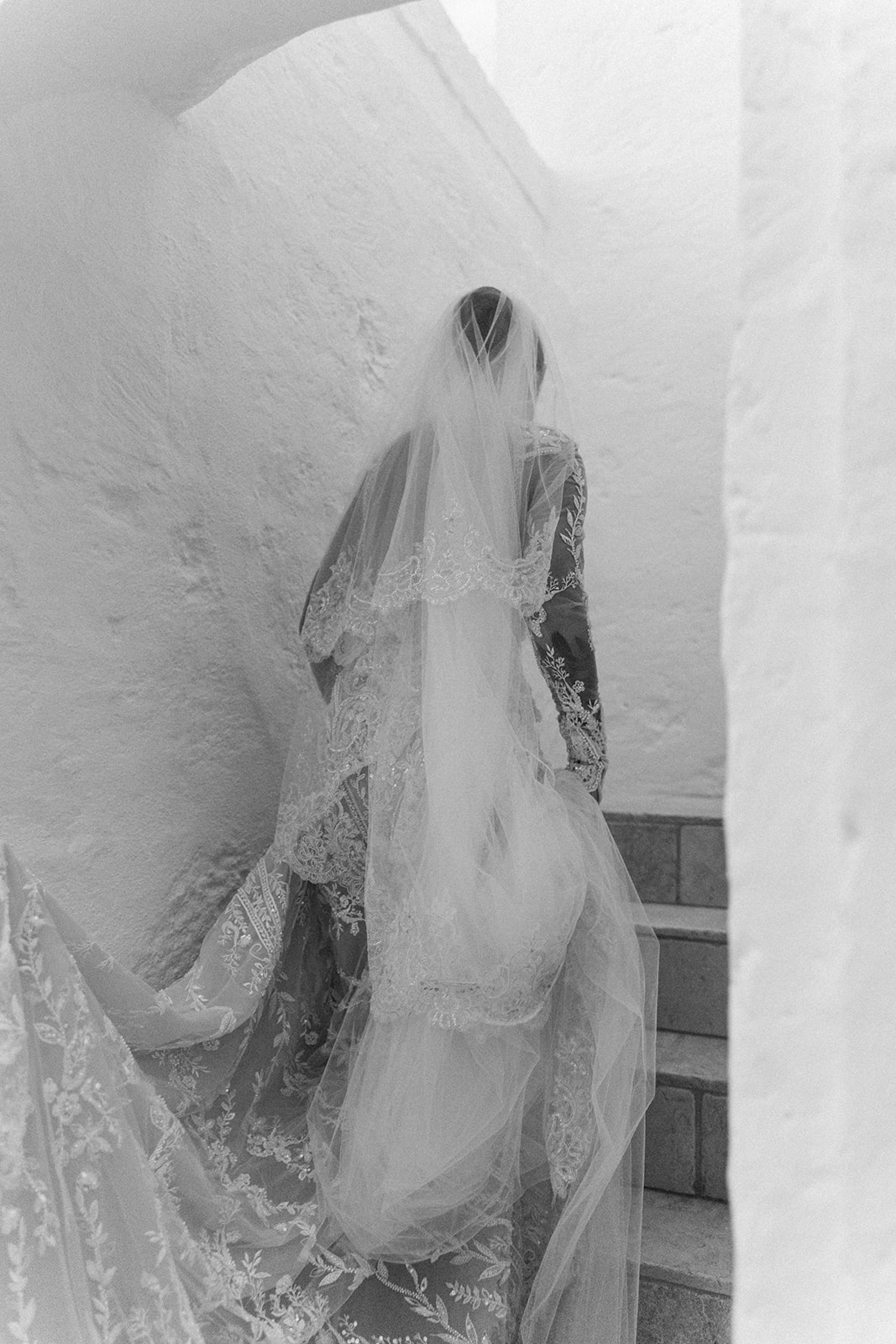 bride walking up stairs in galia lahav remi gown