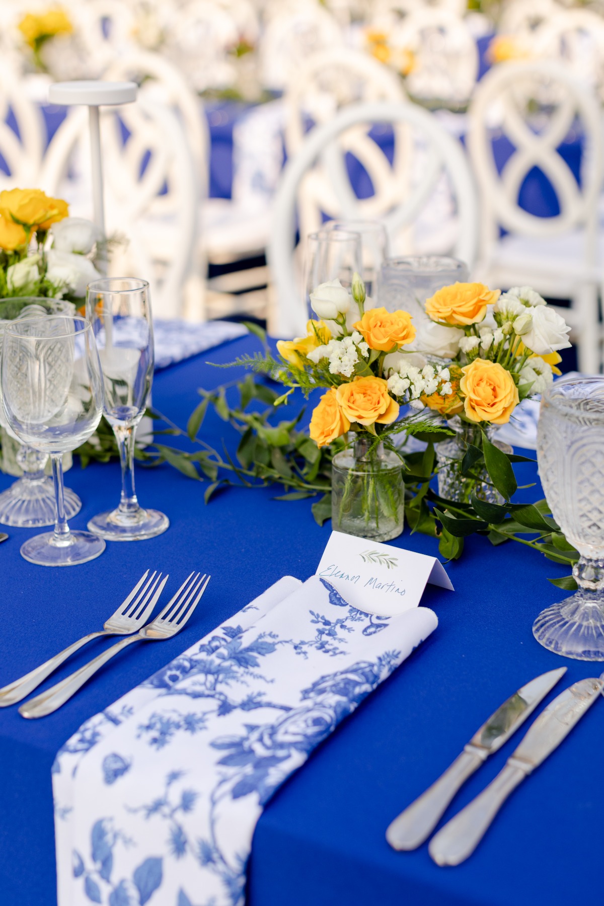 blue and yellow rehearsal dinner decor