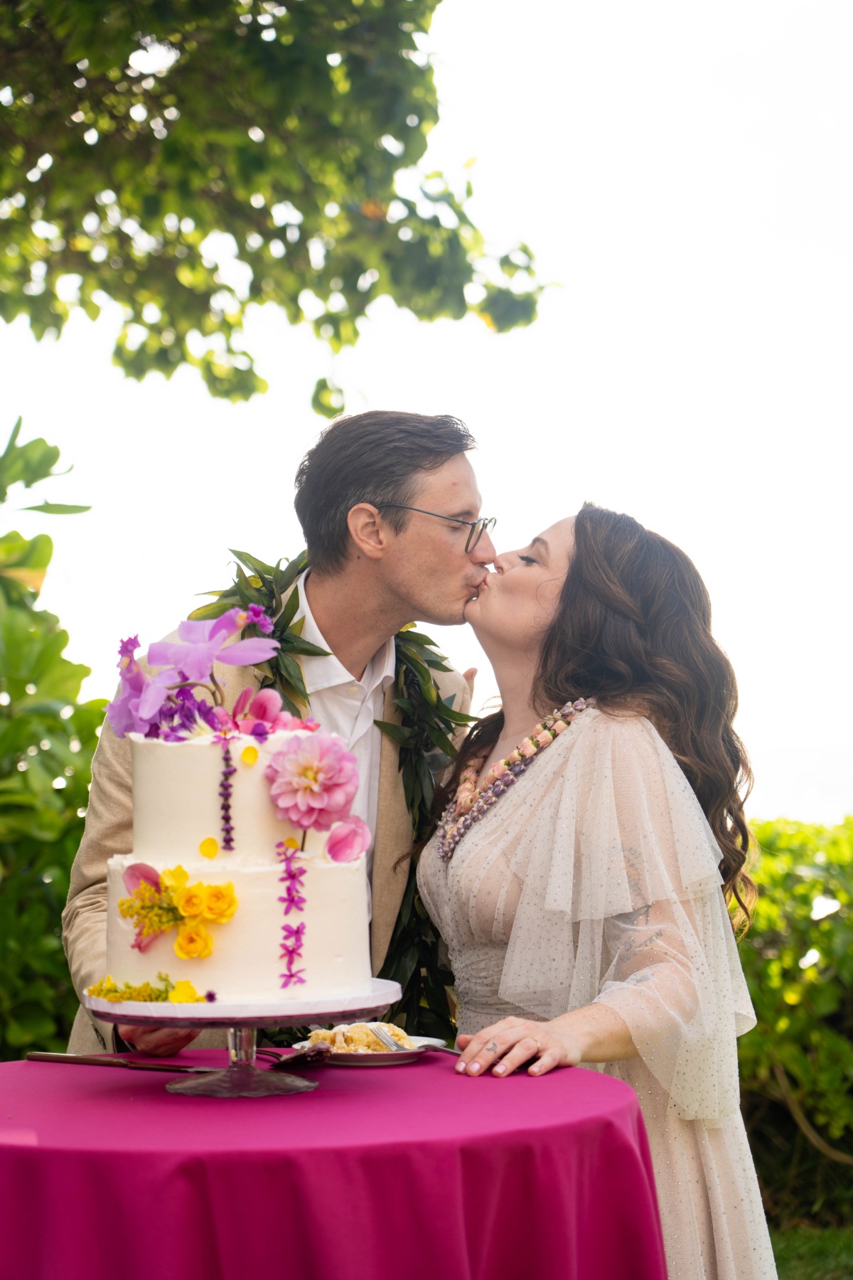 couple cutting wedding cake photo ideas