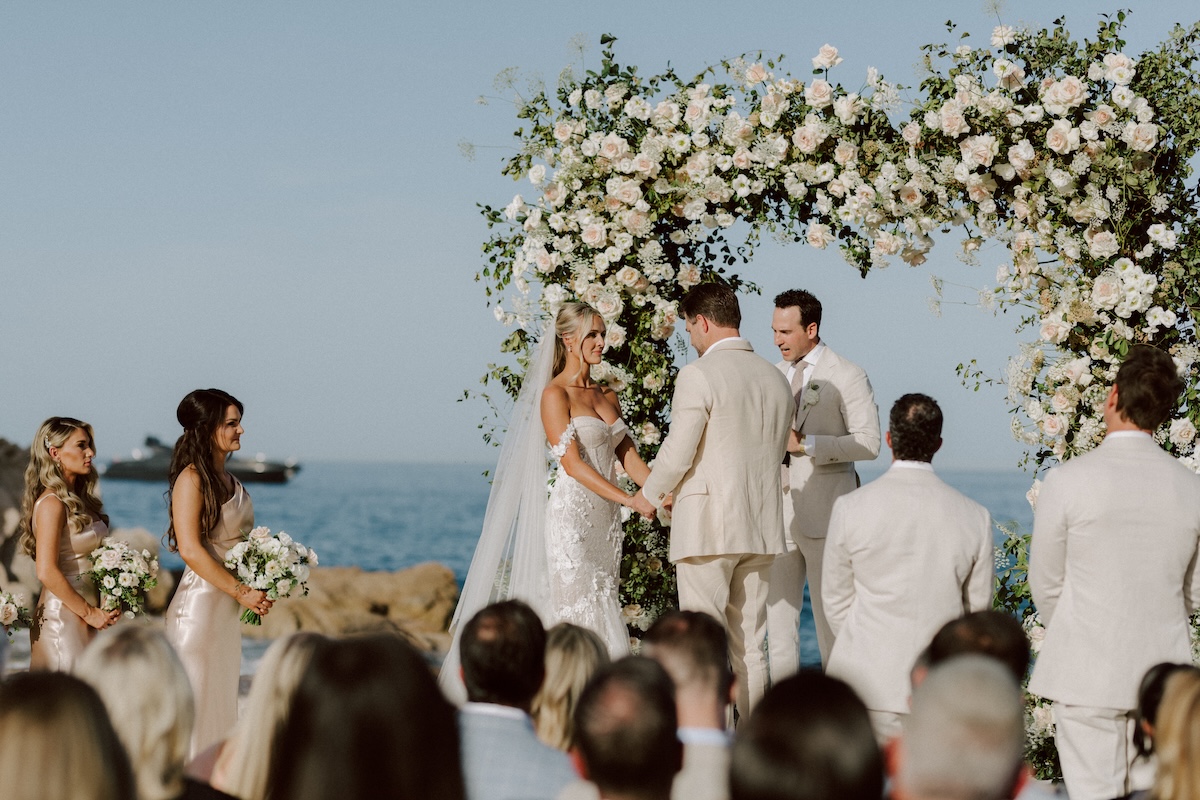 white and off-white roses floral arch