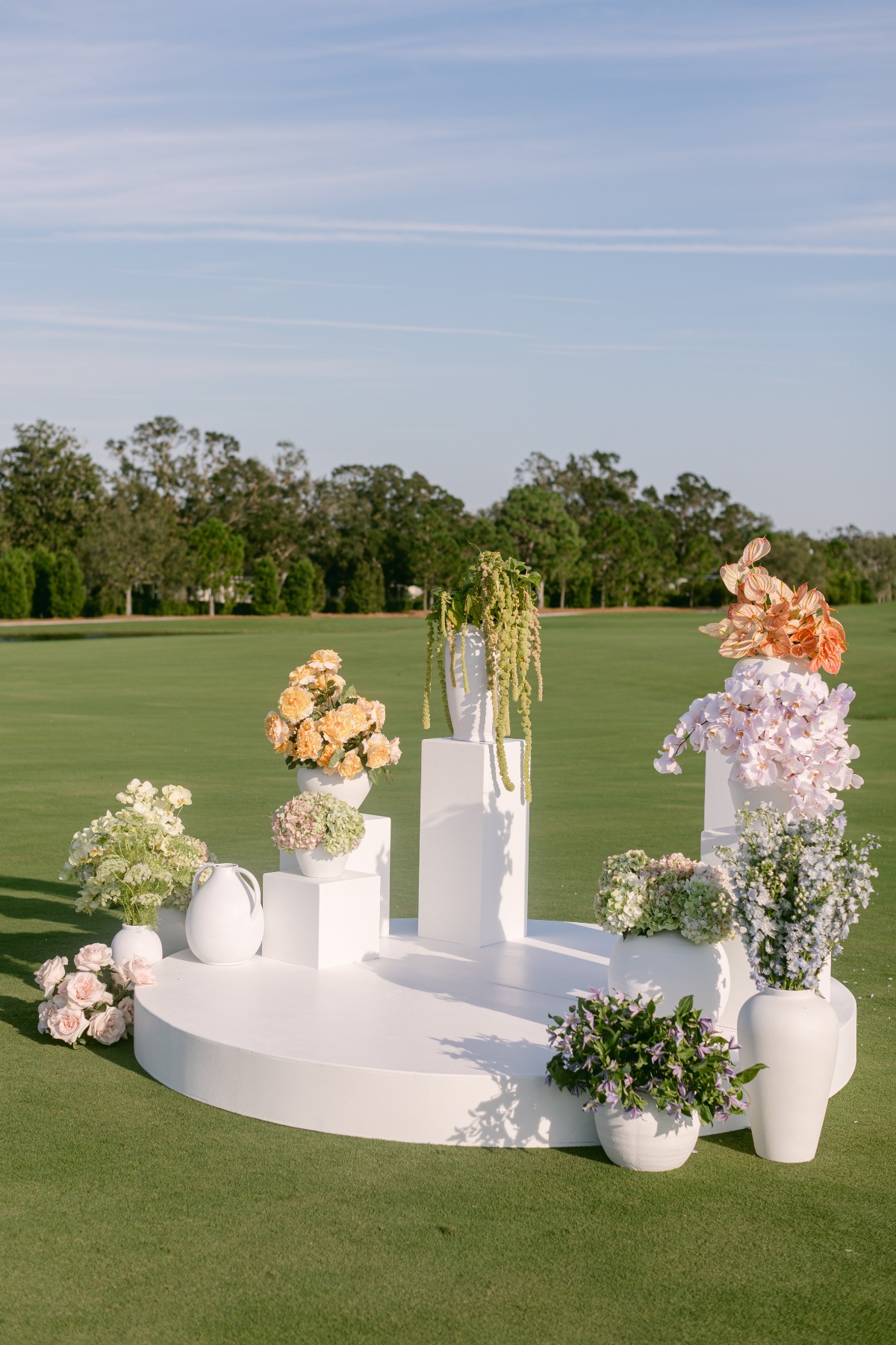 modern pastel wedding ceremony floral arrangements