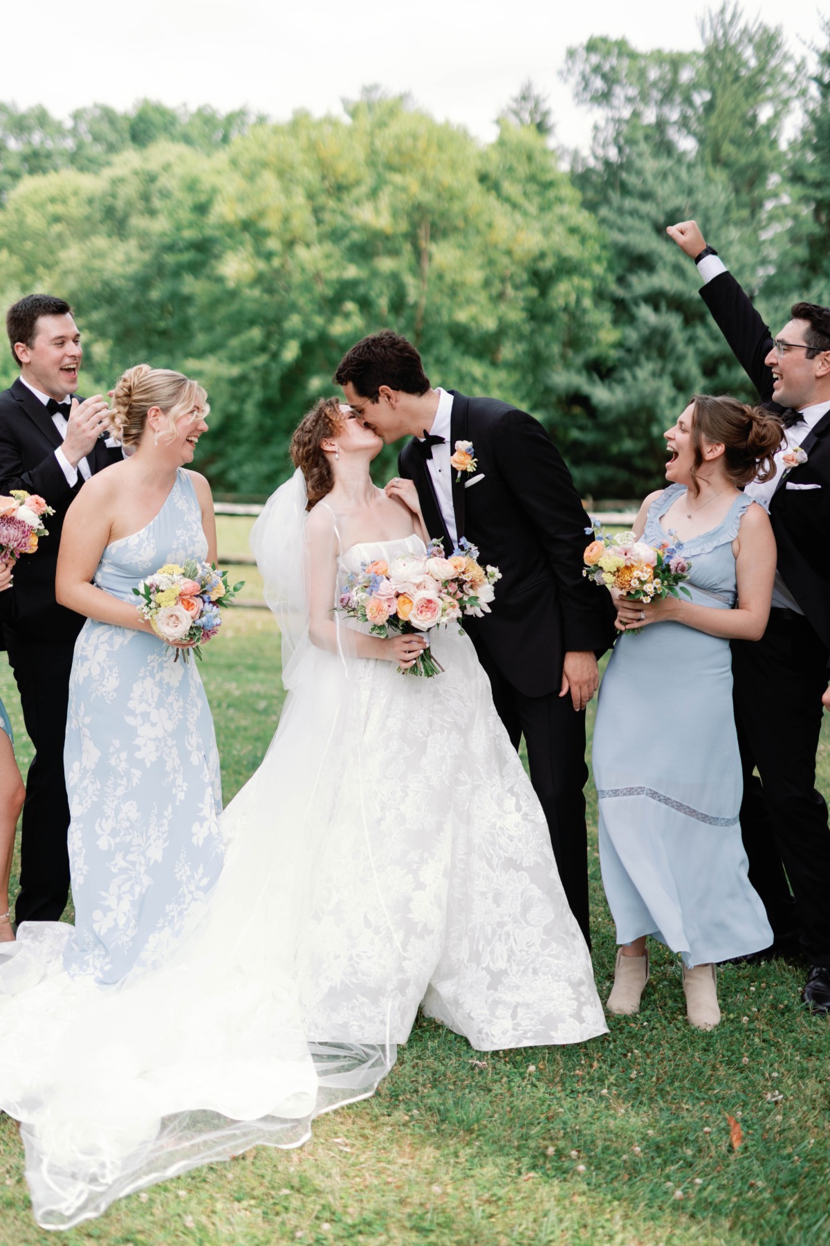 bridesmaids in pastel blue dresses