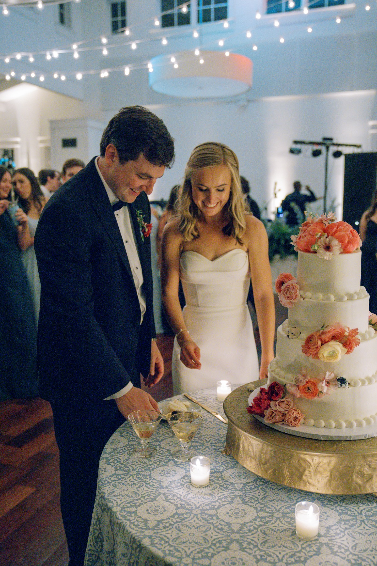 couple cutting wedding cake