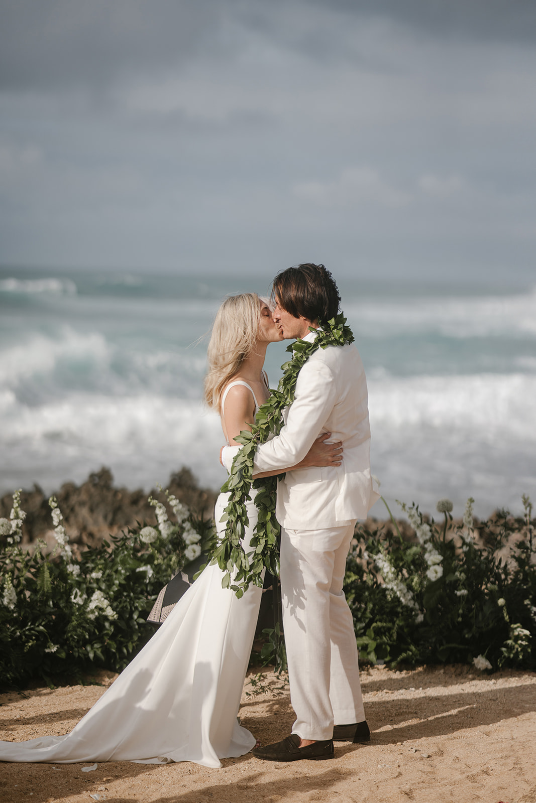 bride and groom get married in hawaii